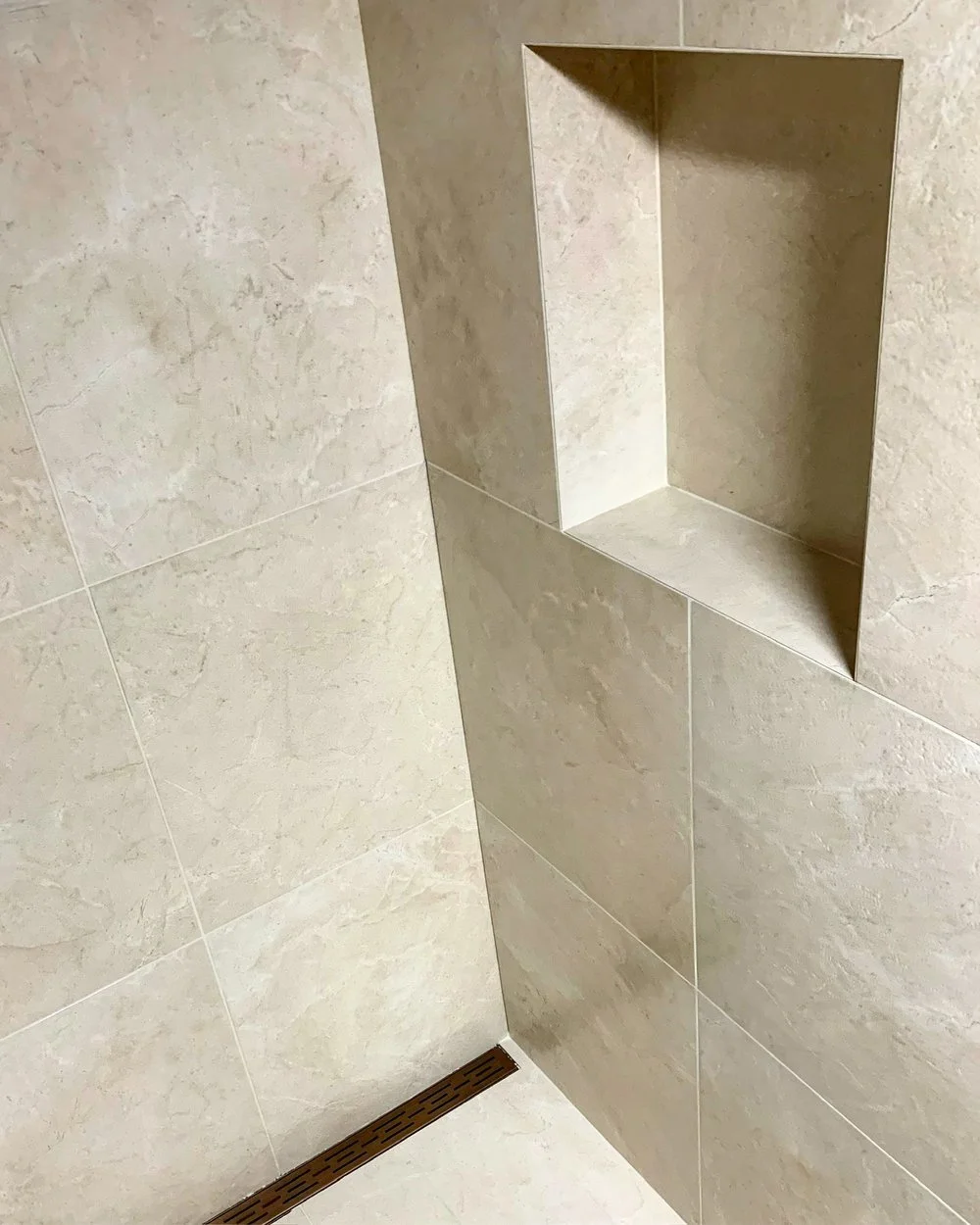Shower Wall Niche  
 
Shower wall niche construction involves creating a recessed area within the shower walls to provide convenient storage for toiletries and other items. The process begins with careful planning to determine the niche's size and l