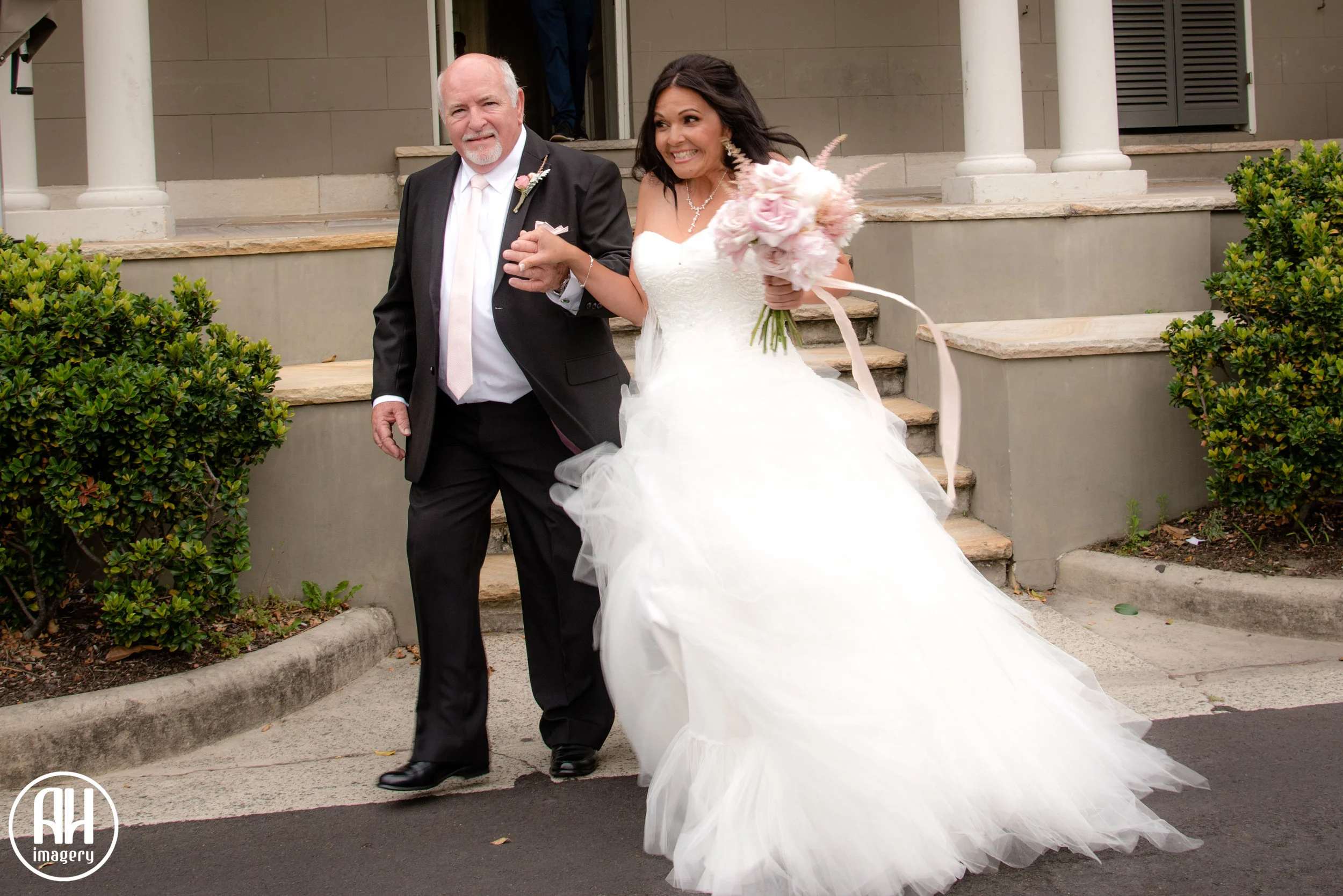 Bride walking down the aisle at Watsons Bay wedding