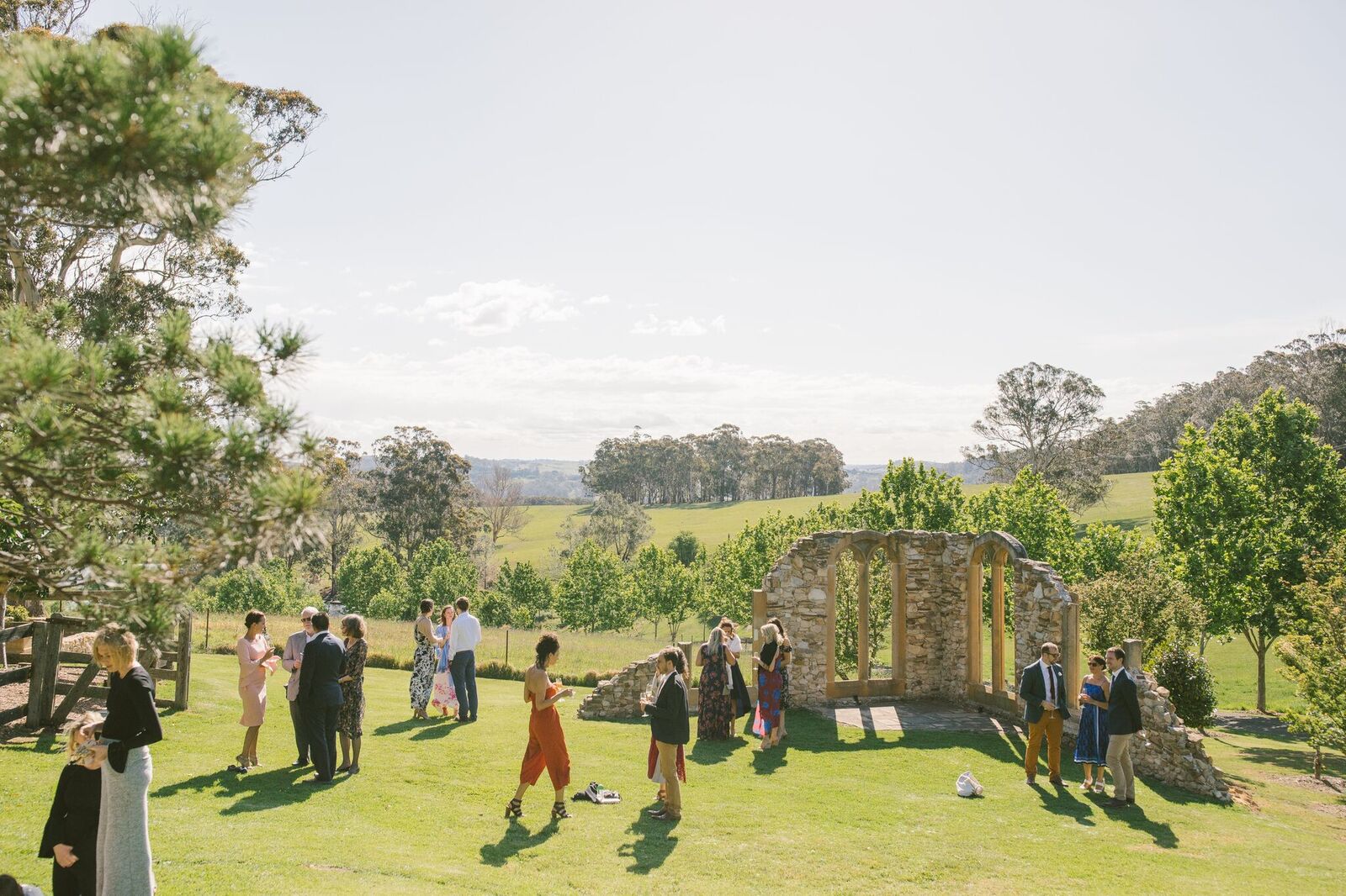 Guests enjoying the outdoors at a wedding