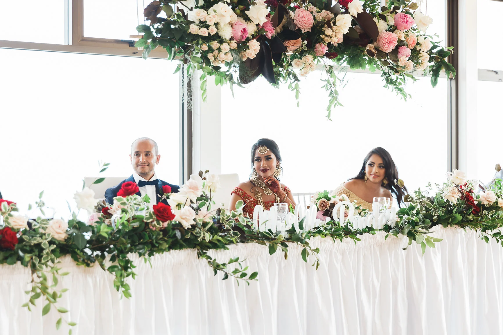 Bride and Groom at Nepalese Wedding Panorama House Bulli. Bridal Table, hanging flowers, bridal table hedge, wedding sign