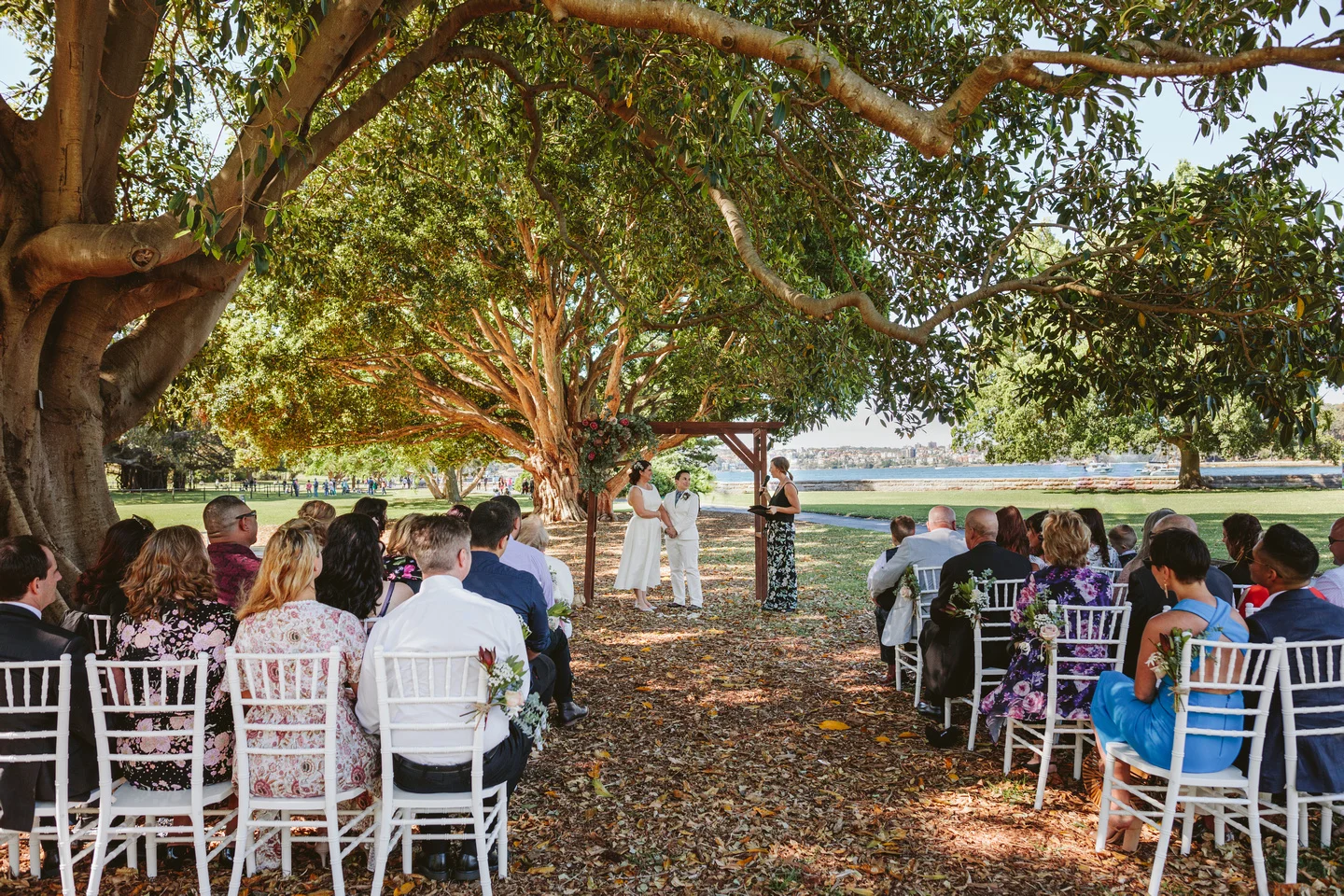 Gay wedding in Sydney, wedding planner Samantha Burke Events. Sydney Royal Botanic Garden’s Fig Tree lawn wedding ceremony