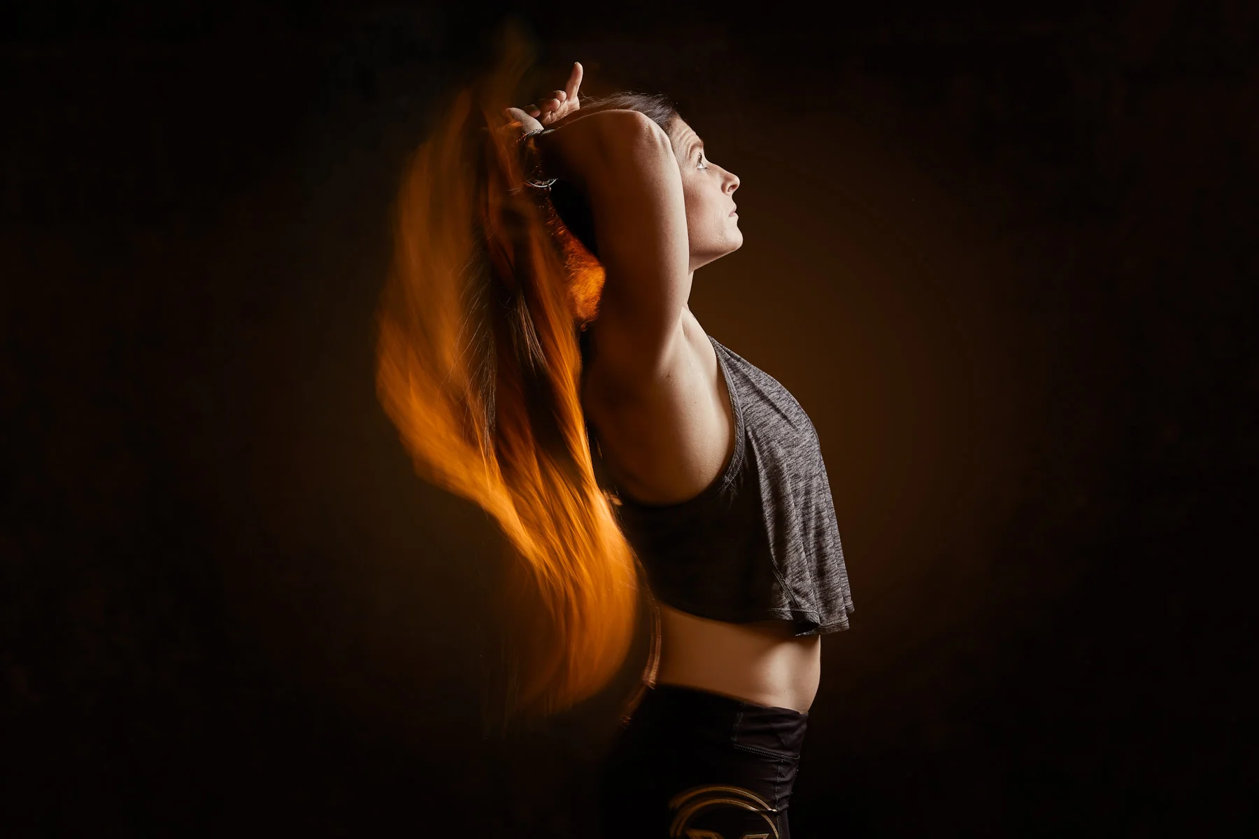 0.4s, f/7.1, 70mm, ISO 100 — Lighting: B10 with OCF Magnum on constant light behind model camera left, B10 with OCF 2’ Octabox camera right.