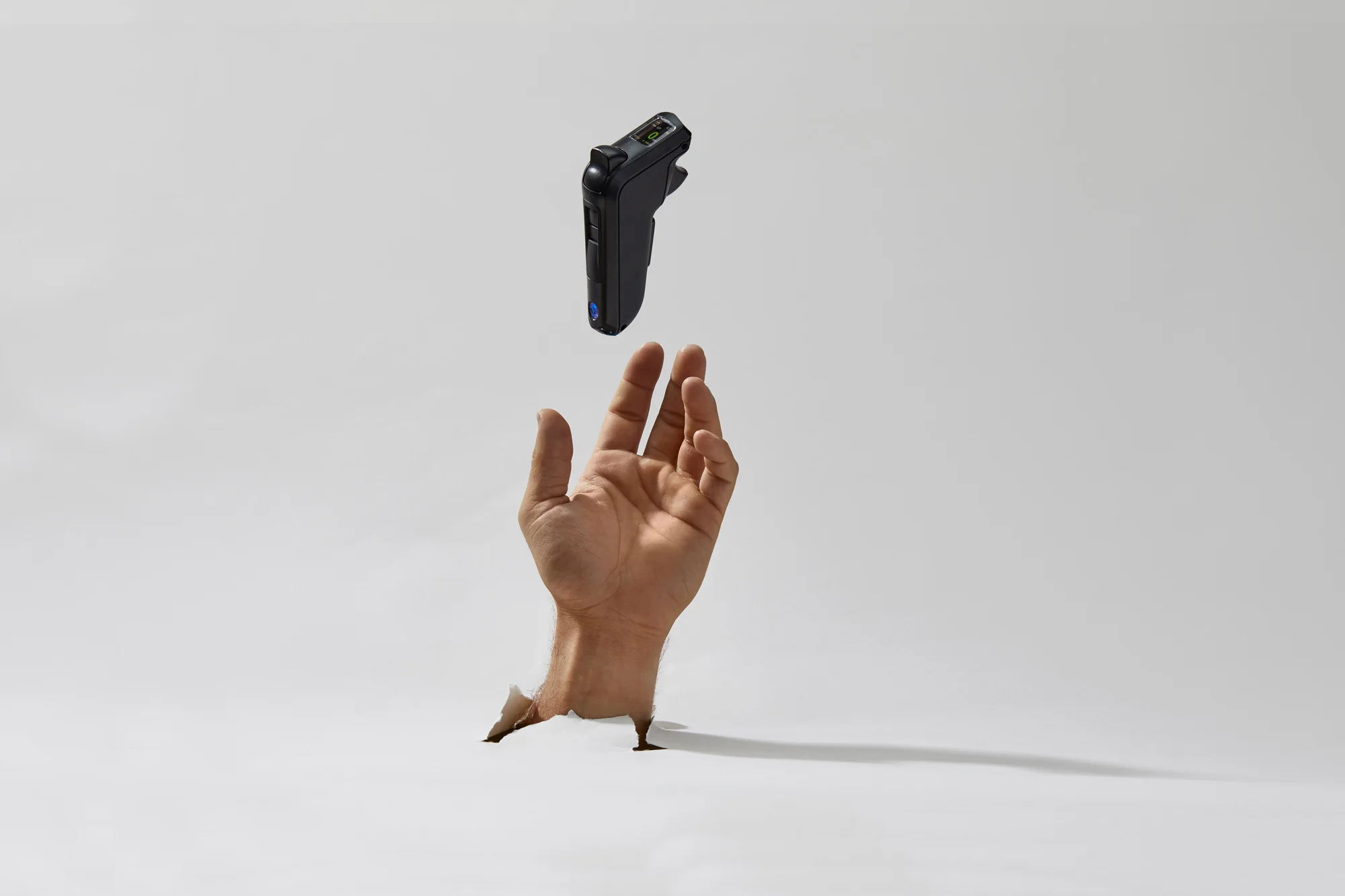 Hand holding remote
