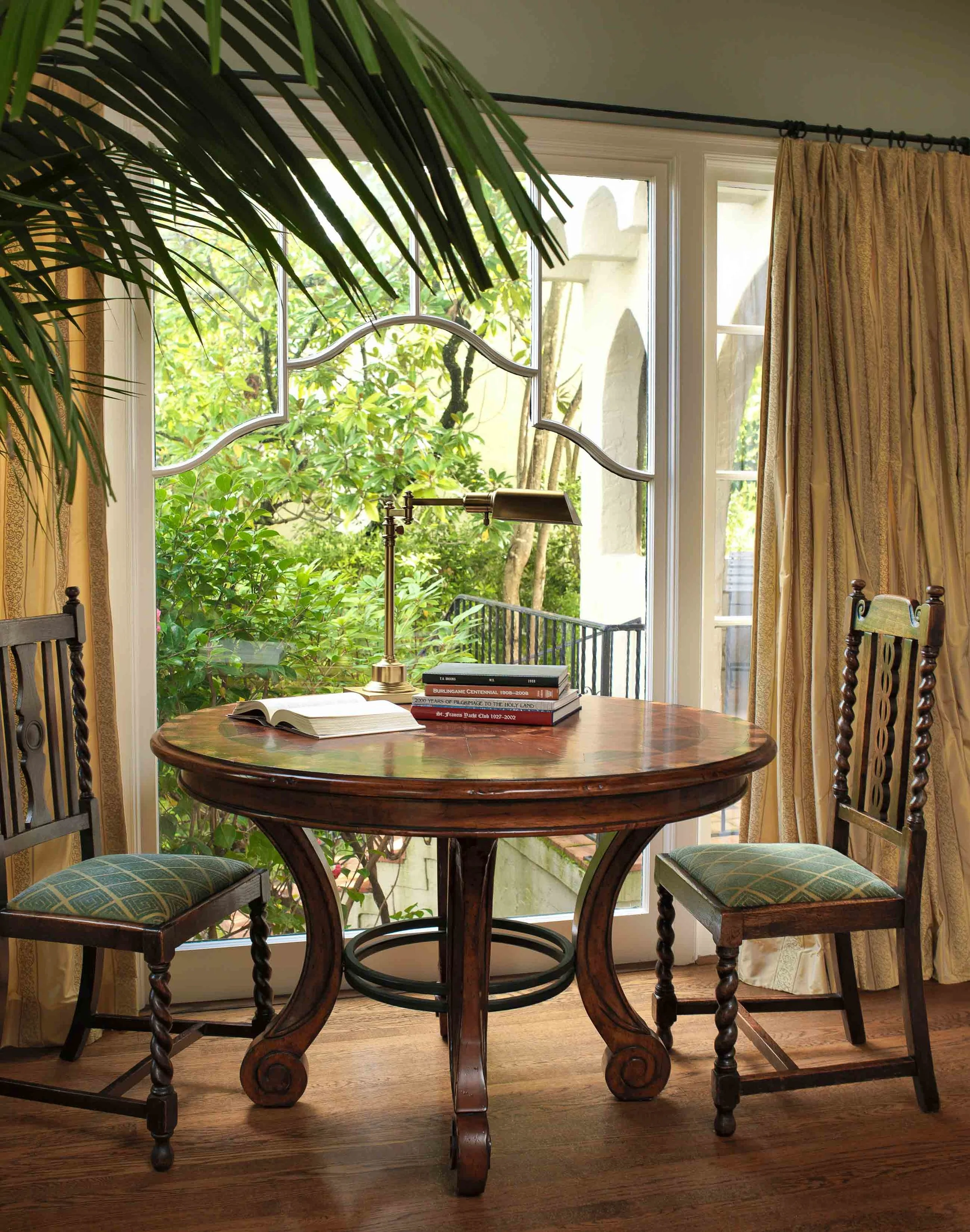 San Mateo Park round table by window. Jana Magginetti Interior Design