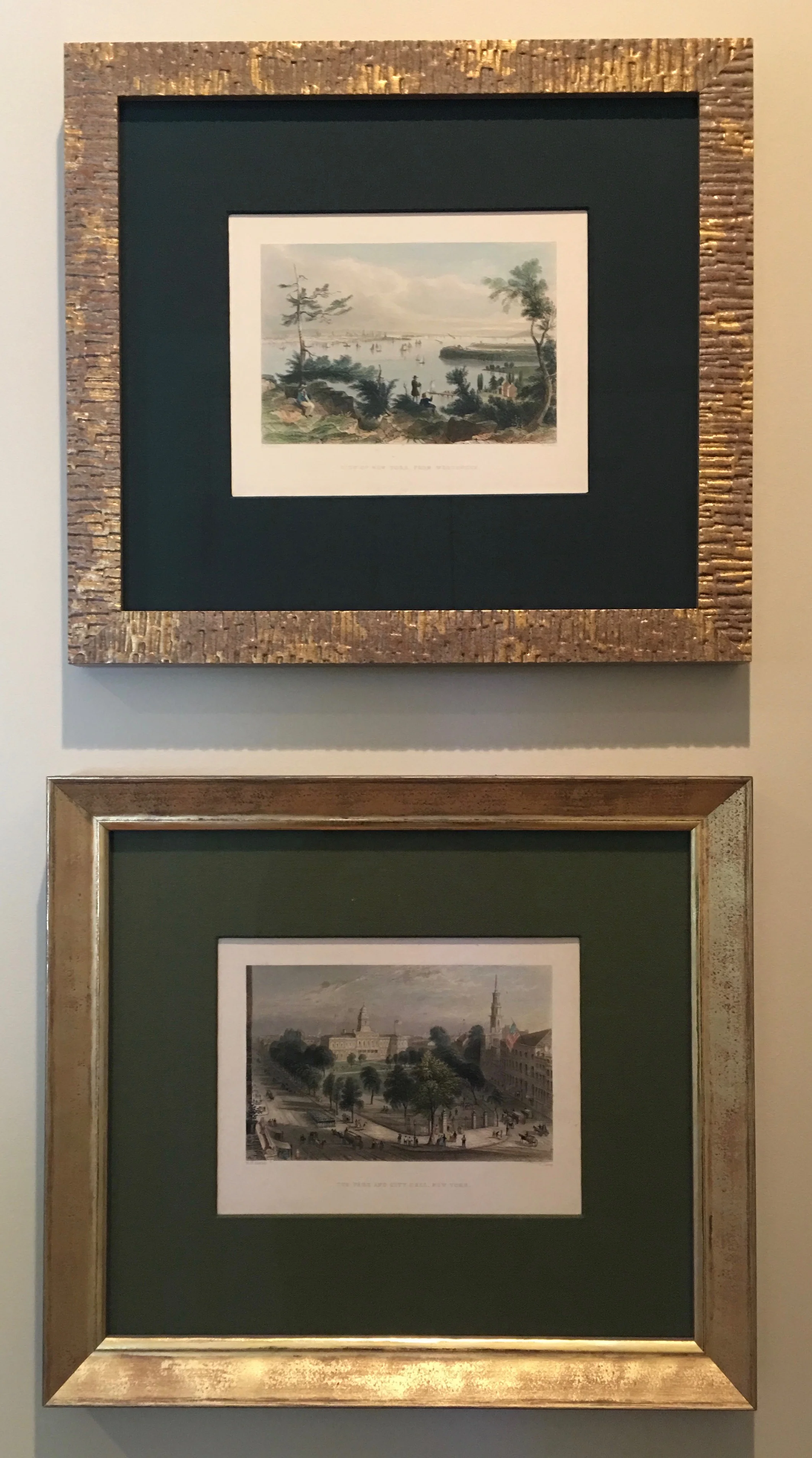 Brushed gold frames and two shades of green mattes accentuate these small intricate works.