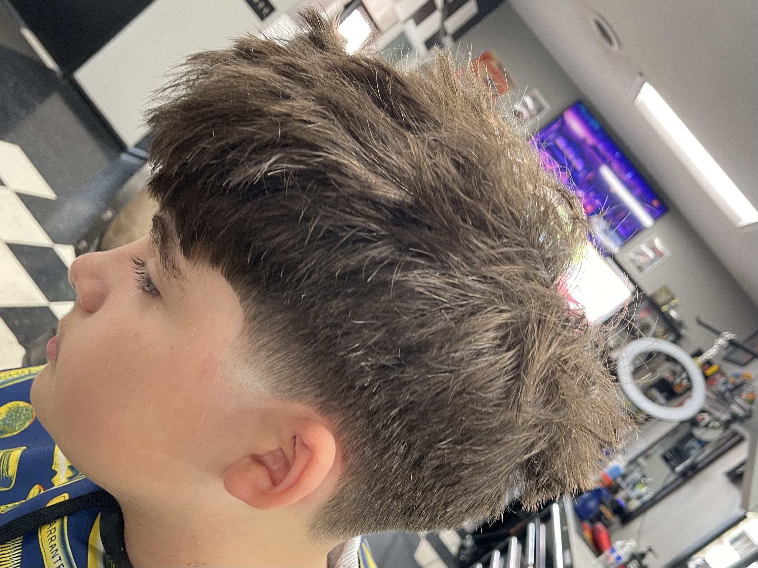 Mid taper fade w/ a textured fringe. #Plainfield #barber #nearyou #alternative