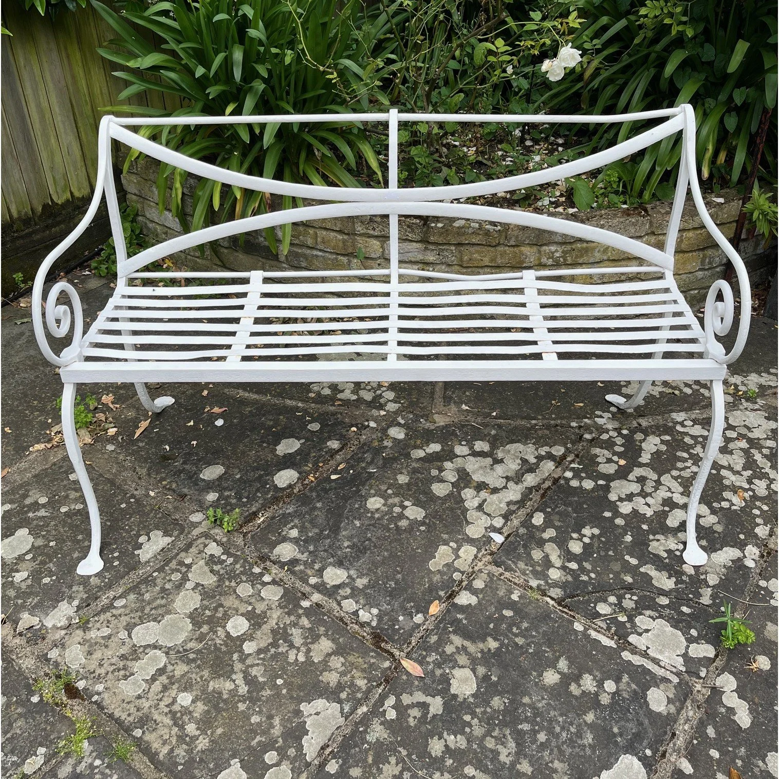 A pair of 19th century Scottish wrought iron garden benches SOLD
