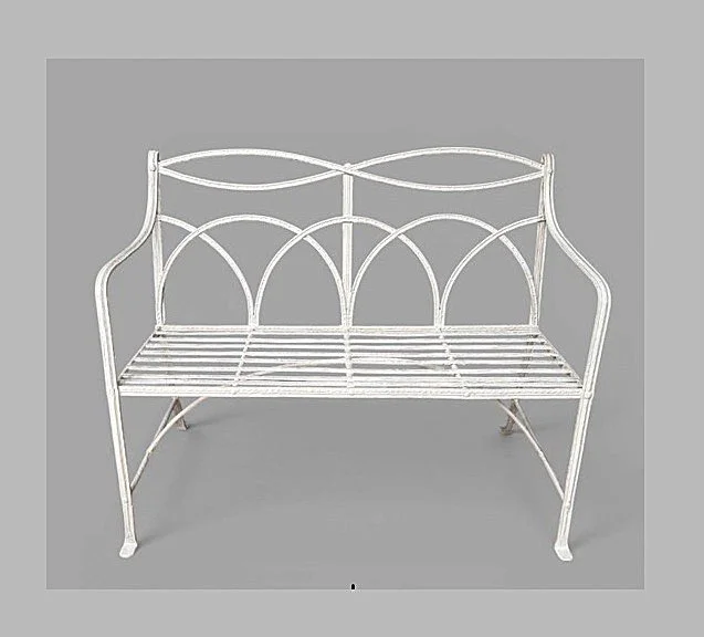 A Regency wrought iron garden seat