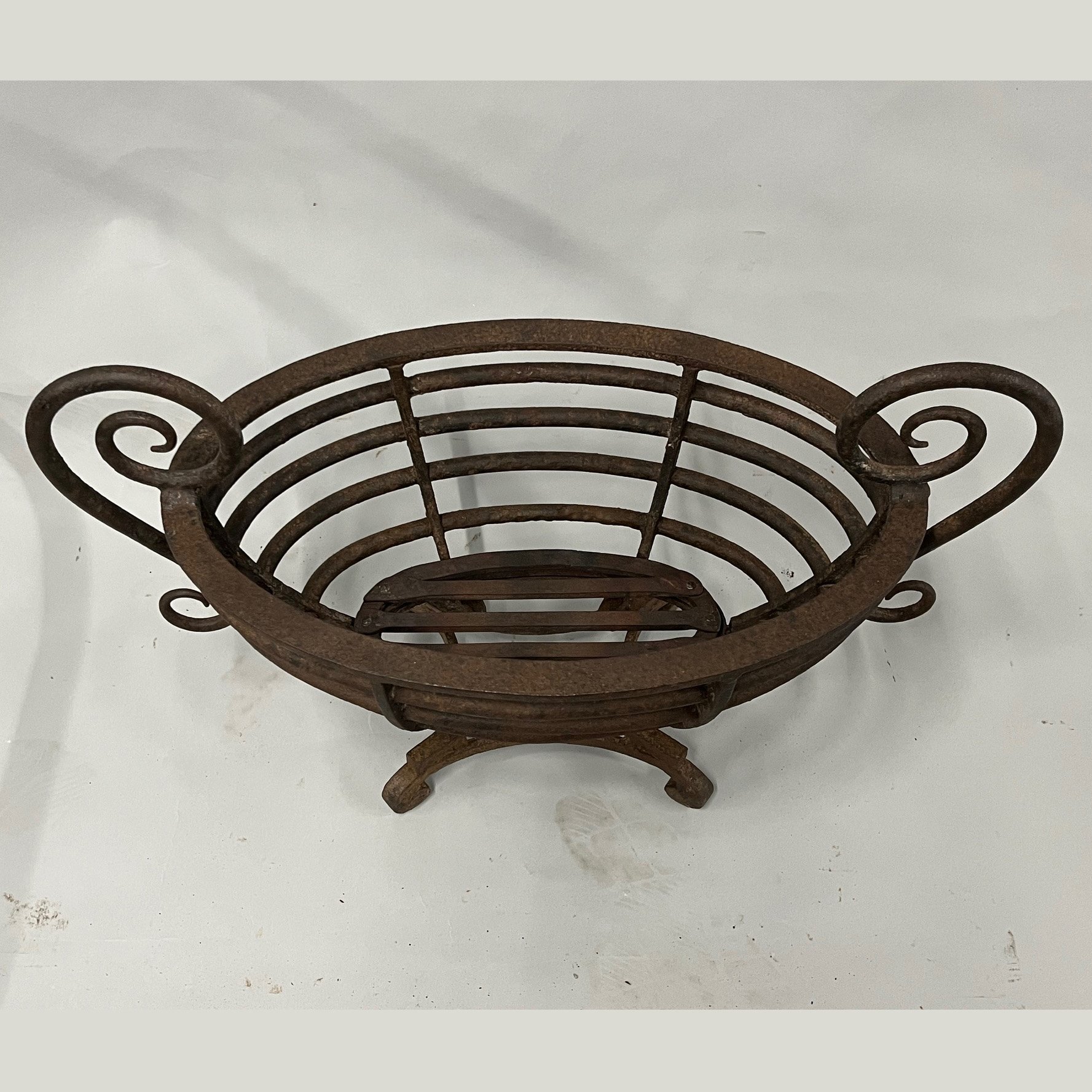4560 A 19thc wrought iron oval firegrate CC.jpg