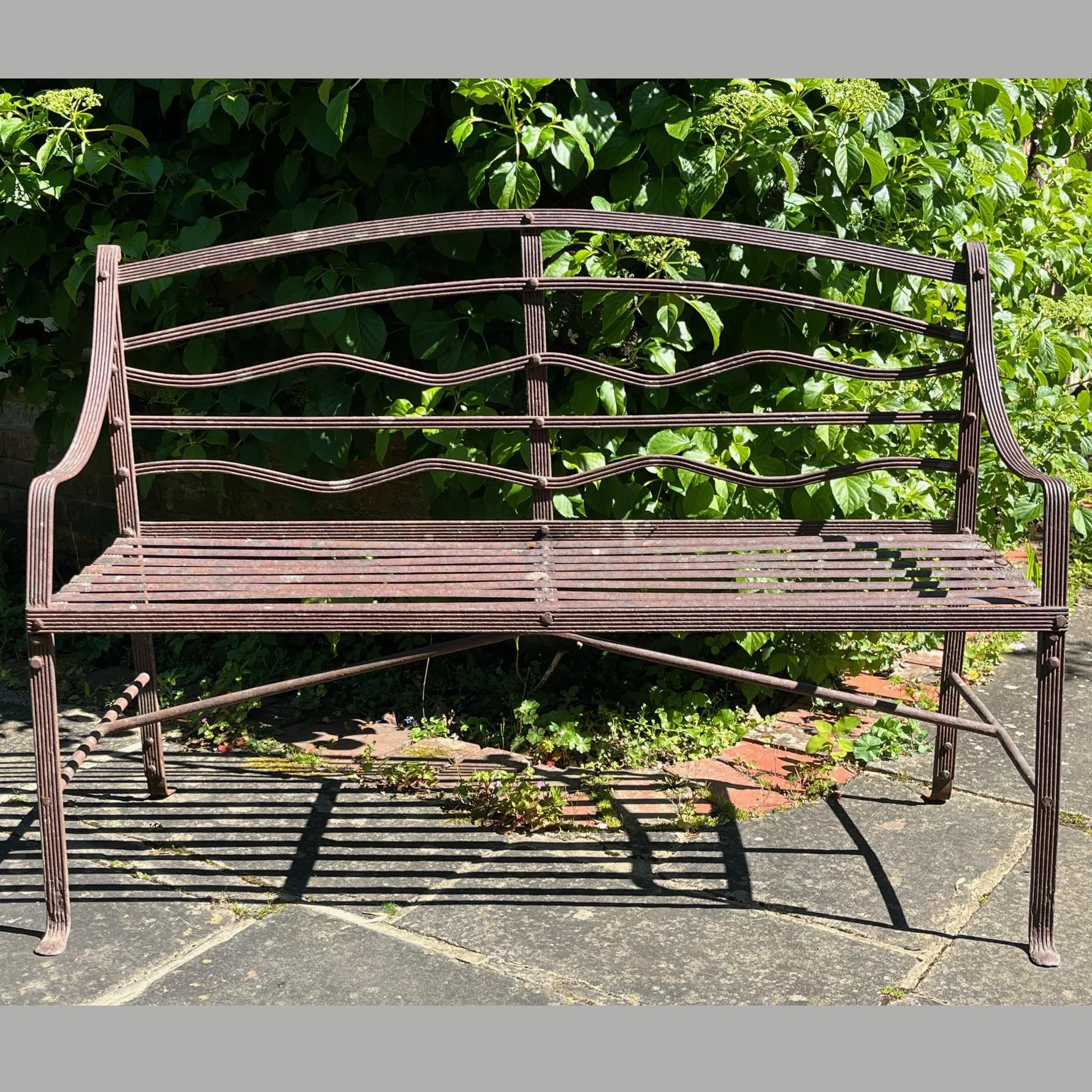 4597 A Late Regency wrought iron garden seat Web A.jpg