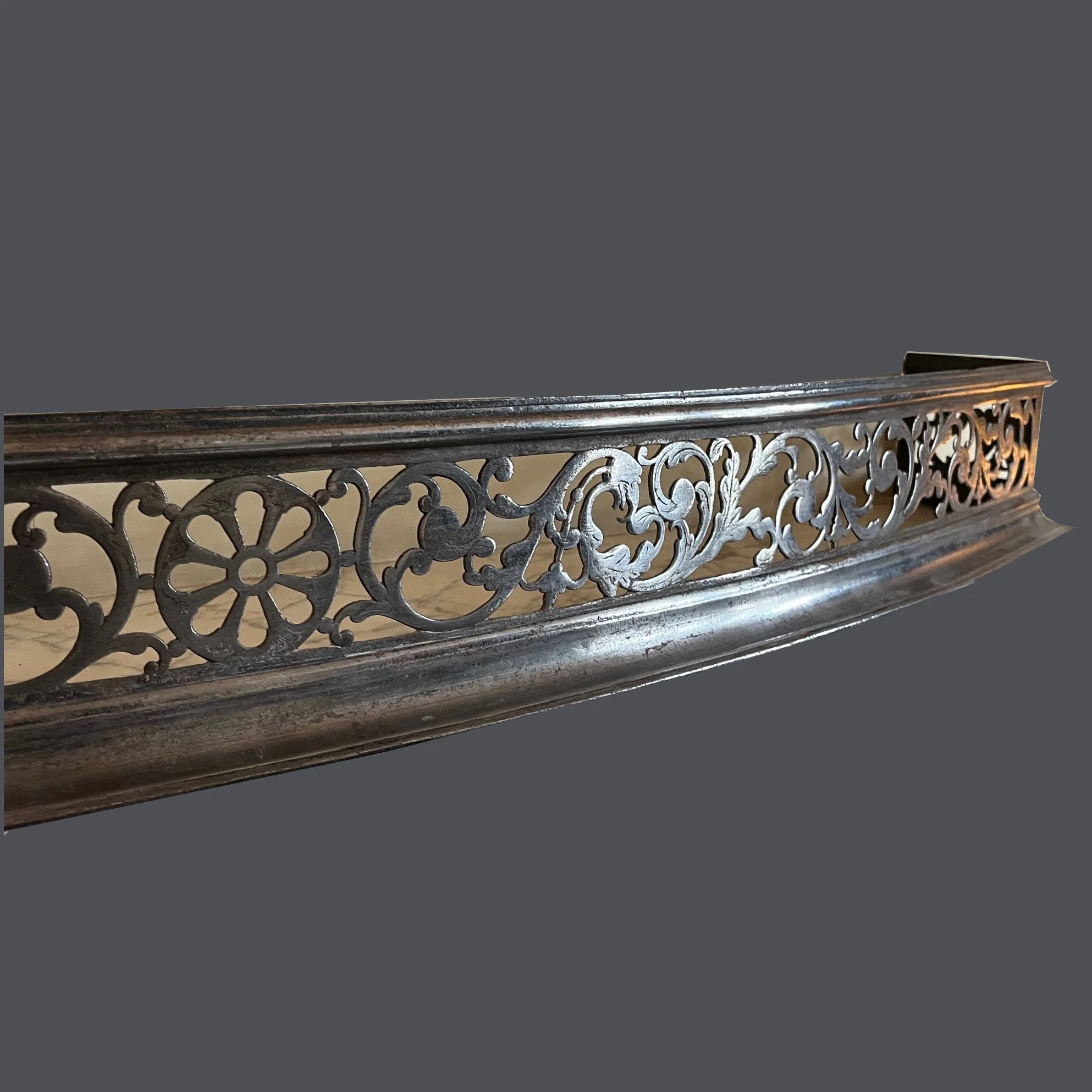 An 18th century Scottish steel fender by David Robertson.