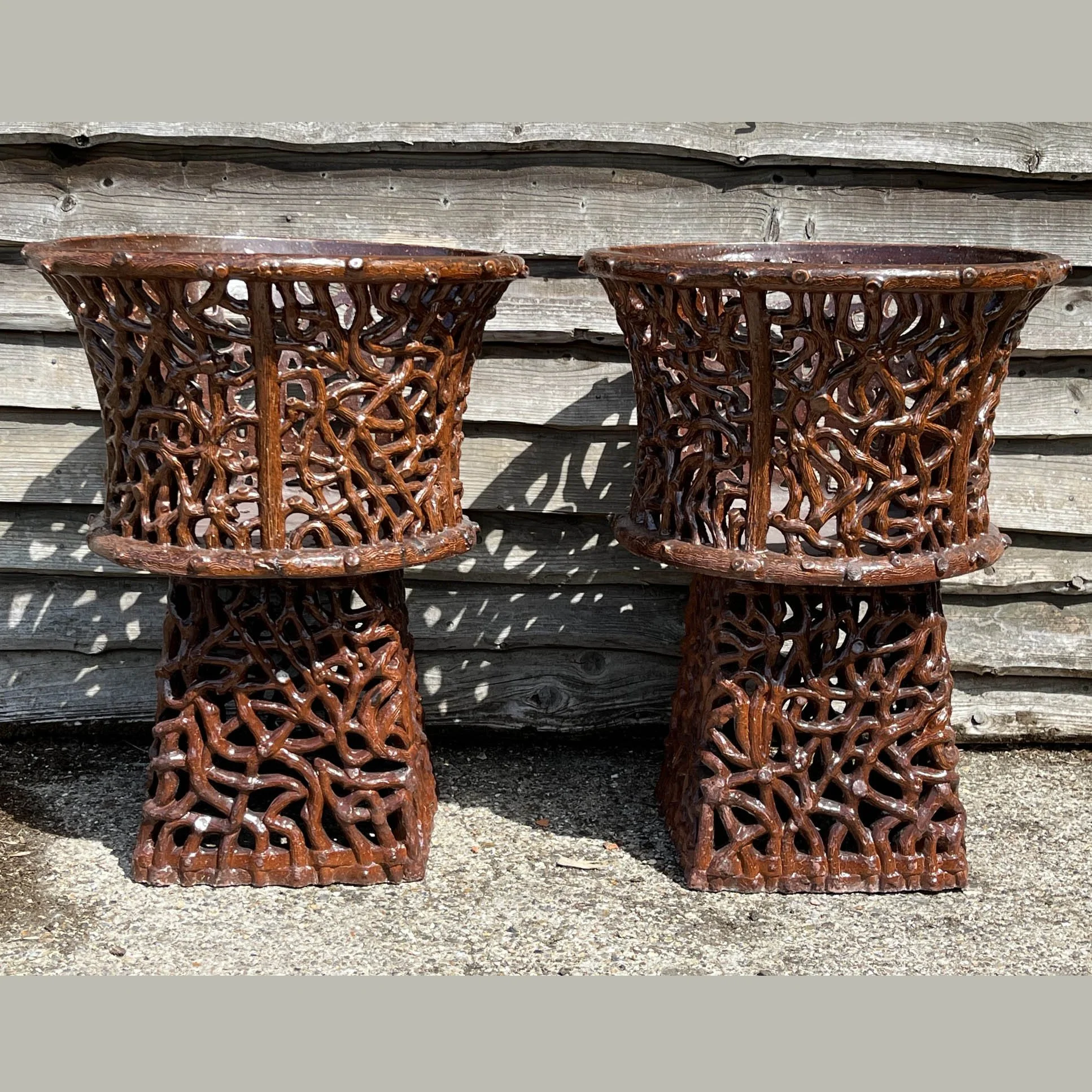 A pair of 19th century Scottish glazed fire clay latticed faux branch garden planters.