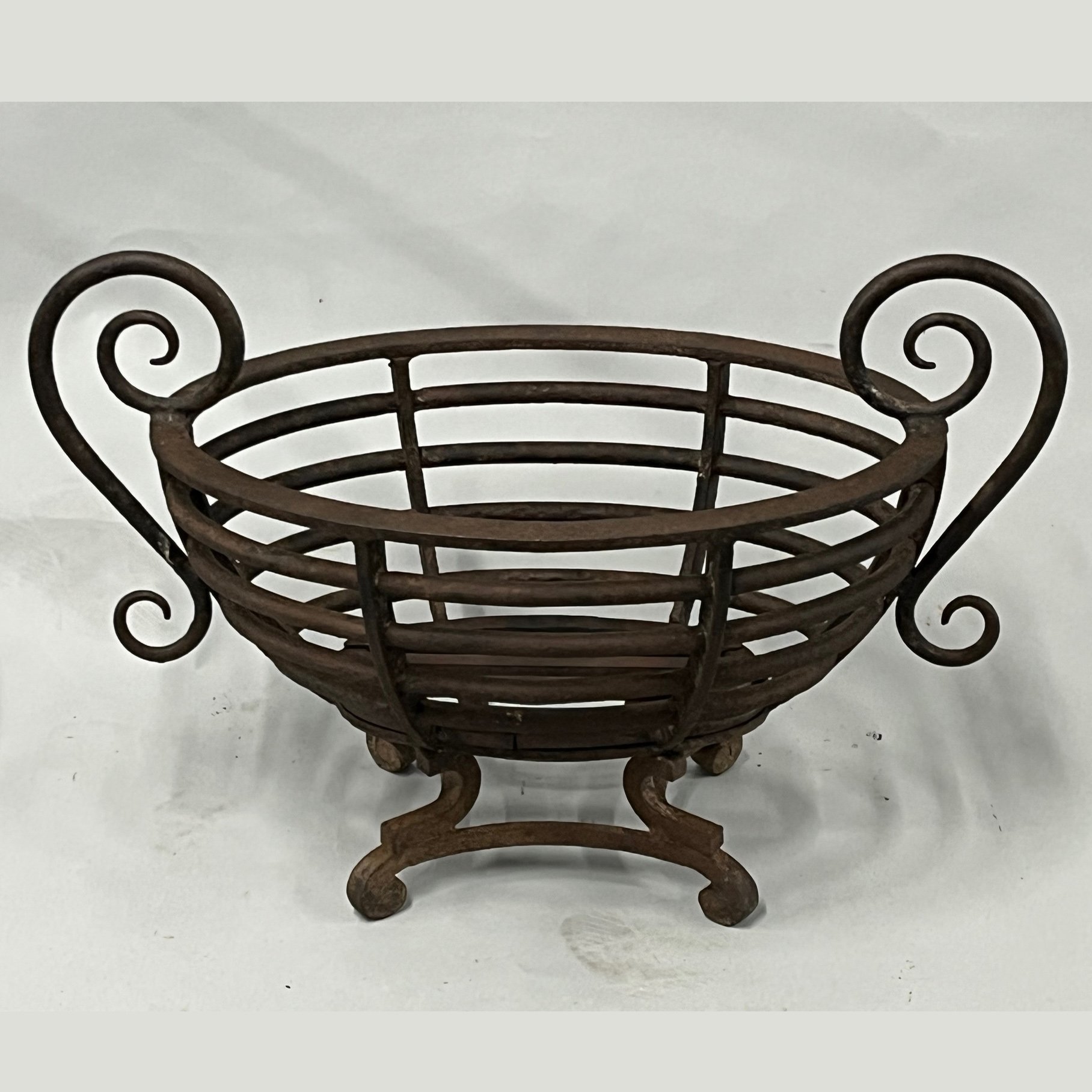 4560 A 19thc wrought iron oval firegrate AA.jpg