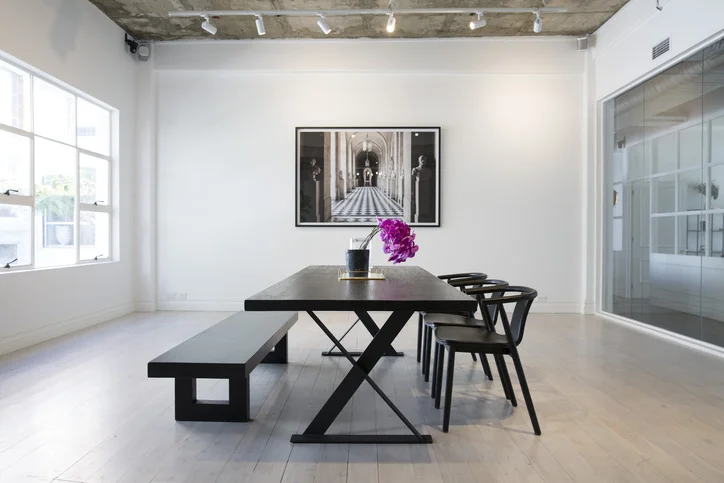 Padded leather chair/Black table with metal legs/Black bench seat