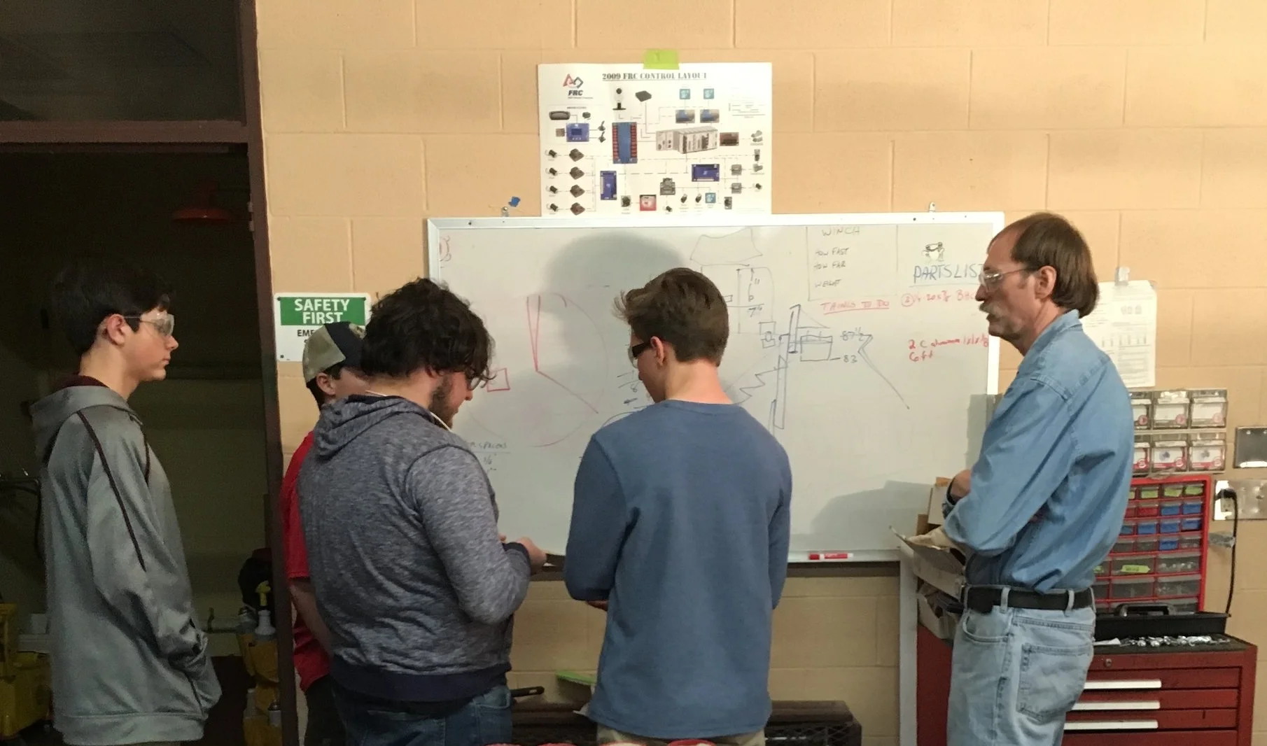 The build team consists of our only Senior this year and four rookies. They may be young but they are fired up and eager to learn.