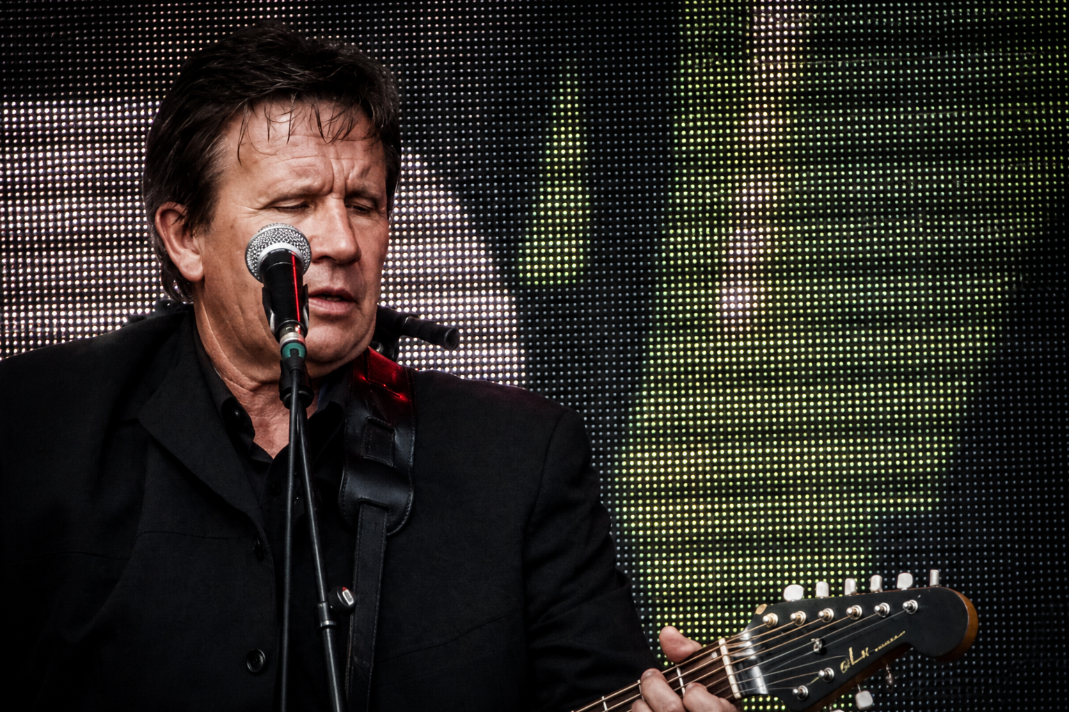 Tom Scott performing as Johnny Cash