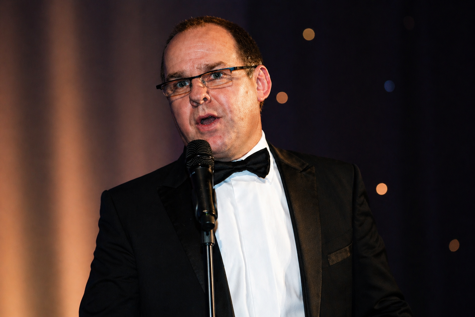 Eric Davidson after dinner speaker comedian on stage