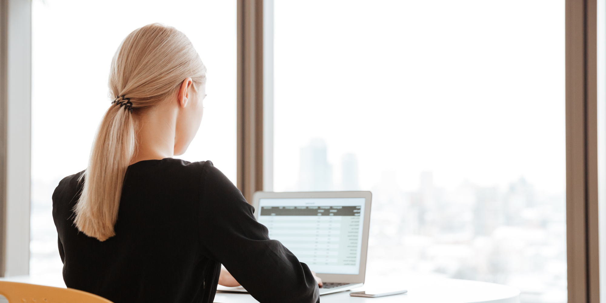 2000x1000-graphicstock-image-of-concentrated-designer-dressed-in-shirt-and-wearing-eyeglasses-working-late-at-night_rUYPxtXu3l.png