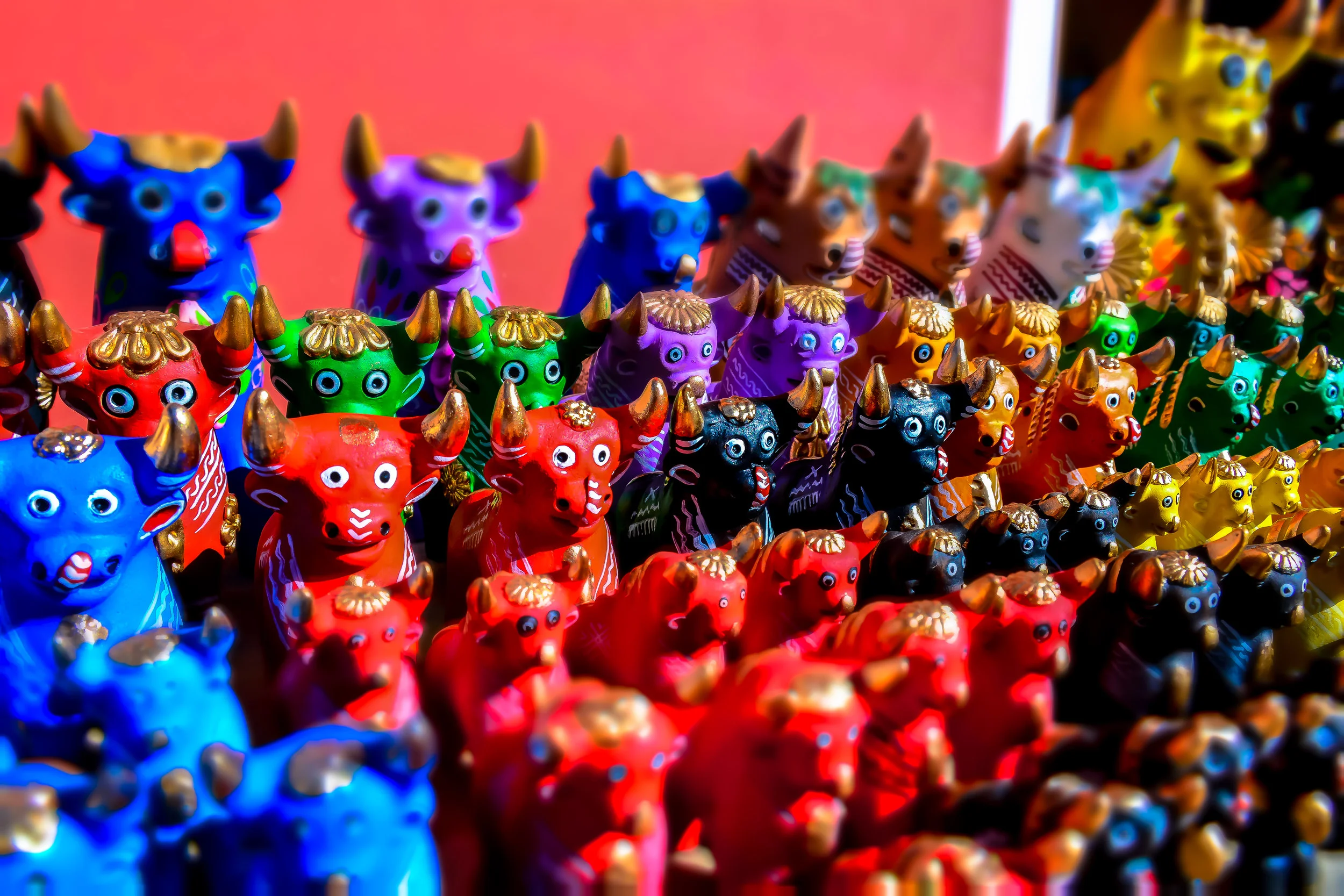 Quite colorful Pucara bulls, Puno, Peru