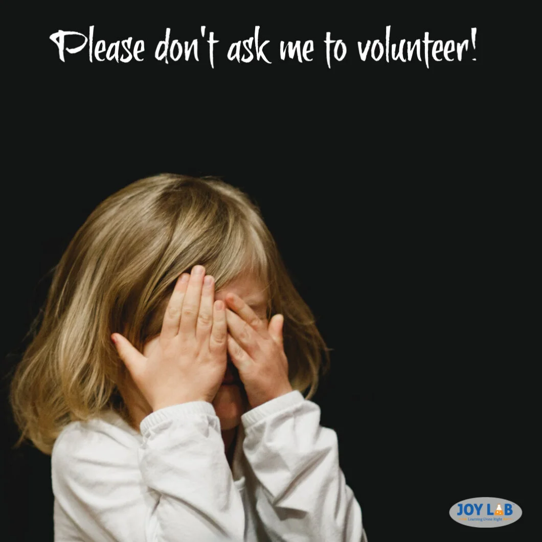 Maybe if she doesn’t see me, she won’t ask me to volunteer.