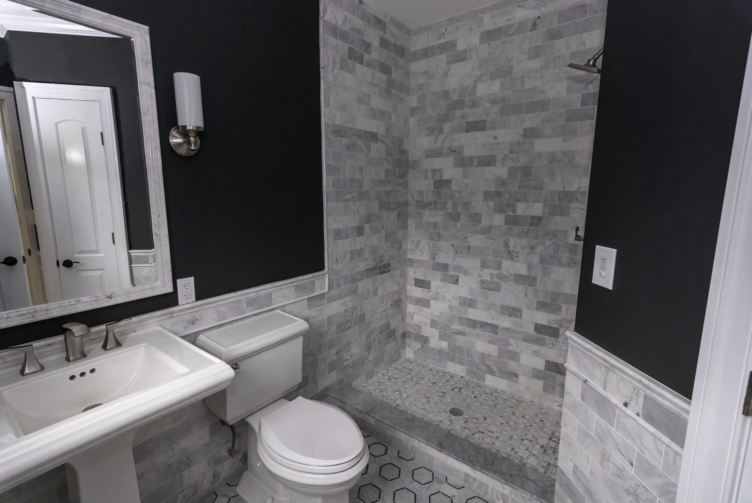 riverhouse 1st bathroom sink and shower.jpg