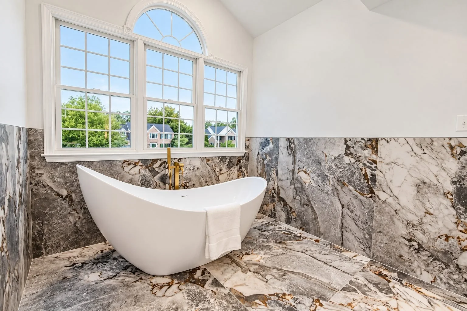 master-bathroom-remodel-freestanding-tub-marble-tile.jpg