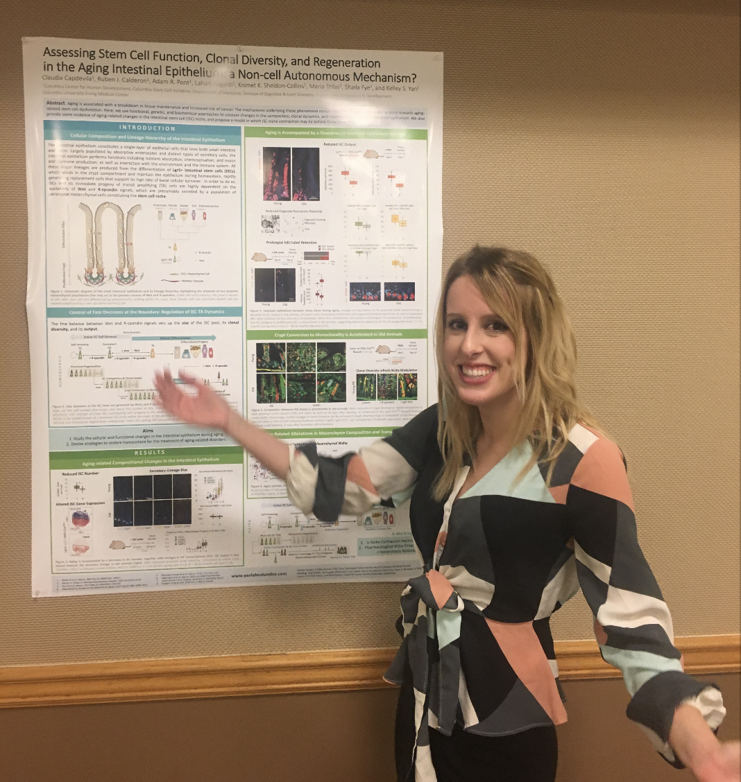 Claudia with her winning poster at the Genetics retreat!