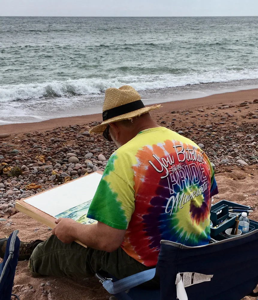 Sitting on the beach promoting Freisen's Bakery! 