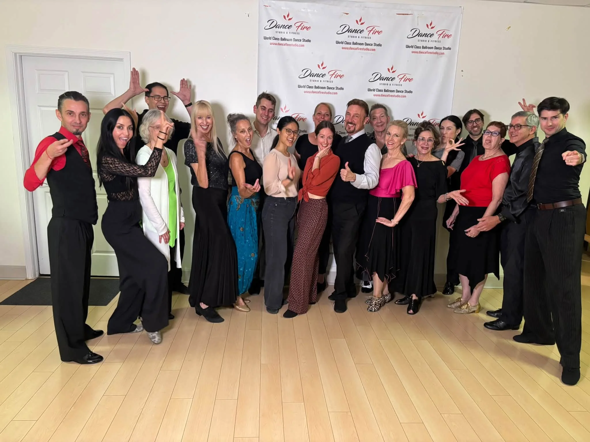 Participants gather for a group photo during Edward Simon’s Dance Fire coaching visit