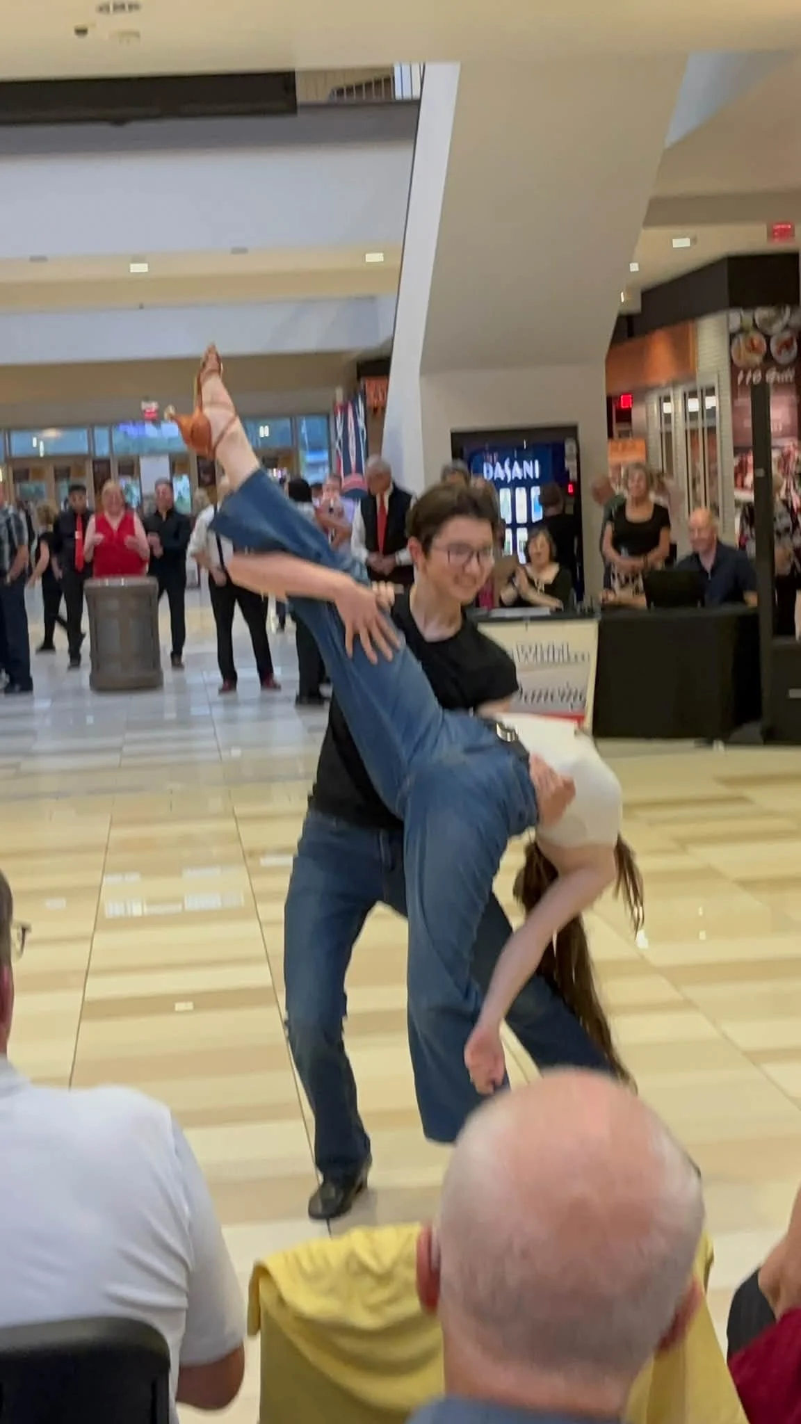 Dance Fire dancers participating in the National Ballroom Dance Week event at Crossgates Mall