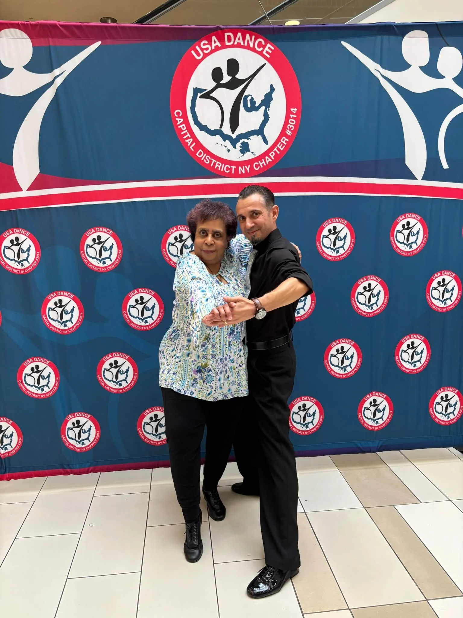 Dance Fire dancers participating in the National Ballroom Dance Week event at Crossgates Mall