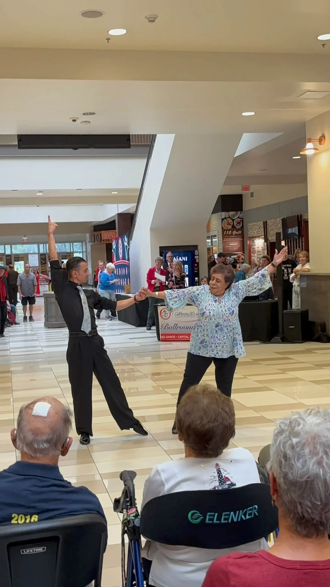 Dance Fire dancers participating in the National Ballroom Dance Week event at Crossgates Mall
