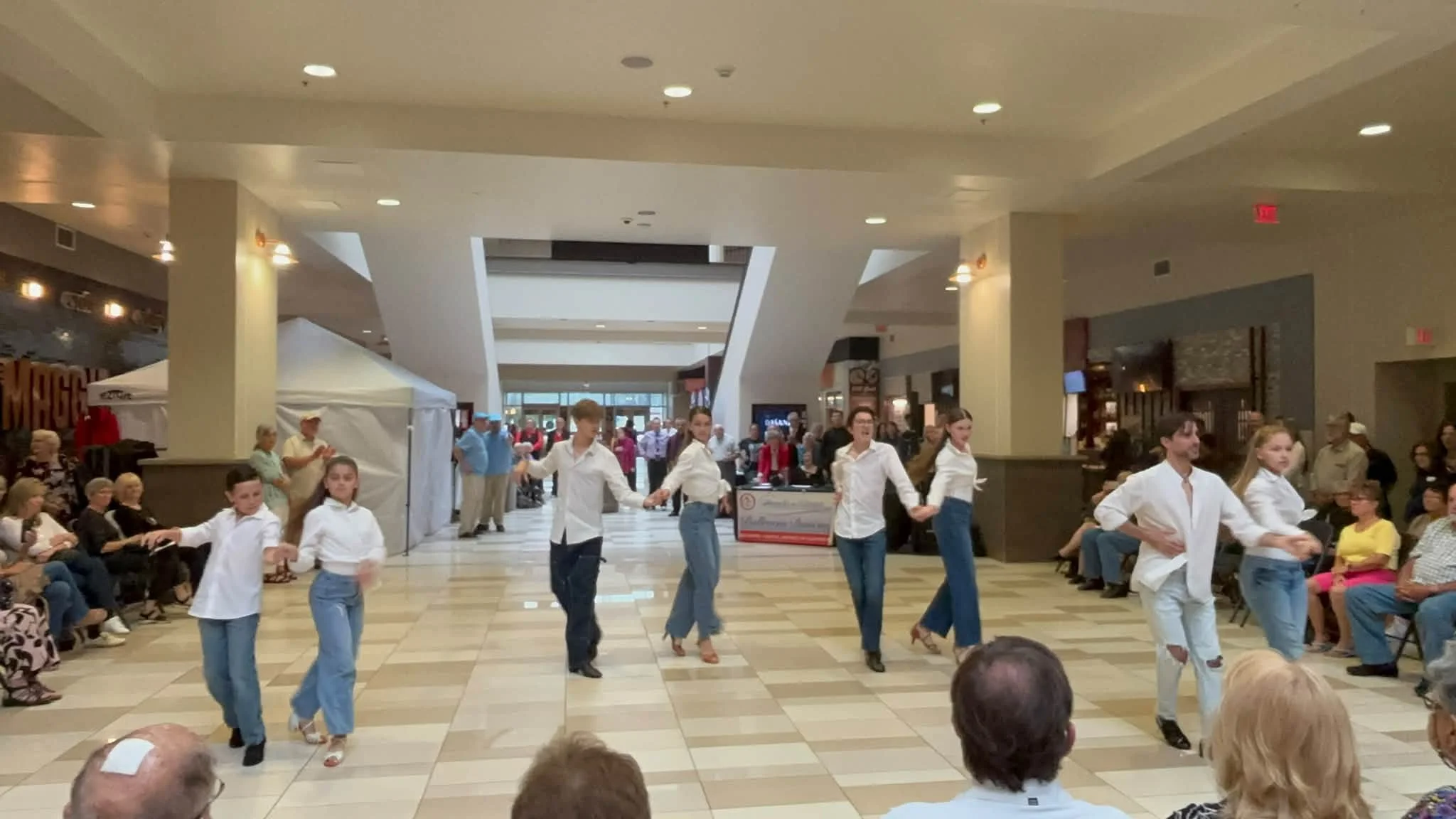 Dance Fire dancers at the Crossgates Mall National Ballroom Dance Week celebration in September 2026