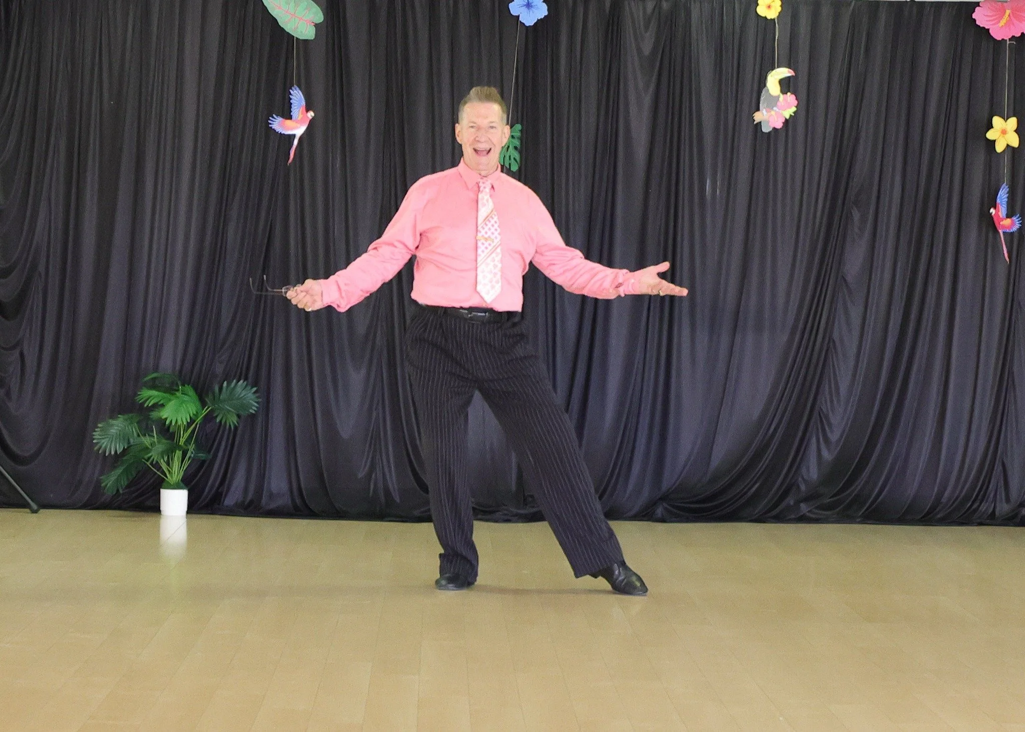 A dancer in a pink top performs at the Summer Showcase