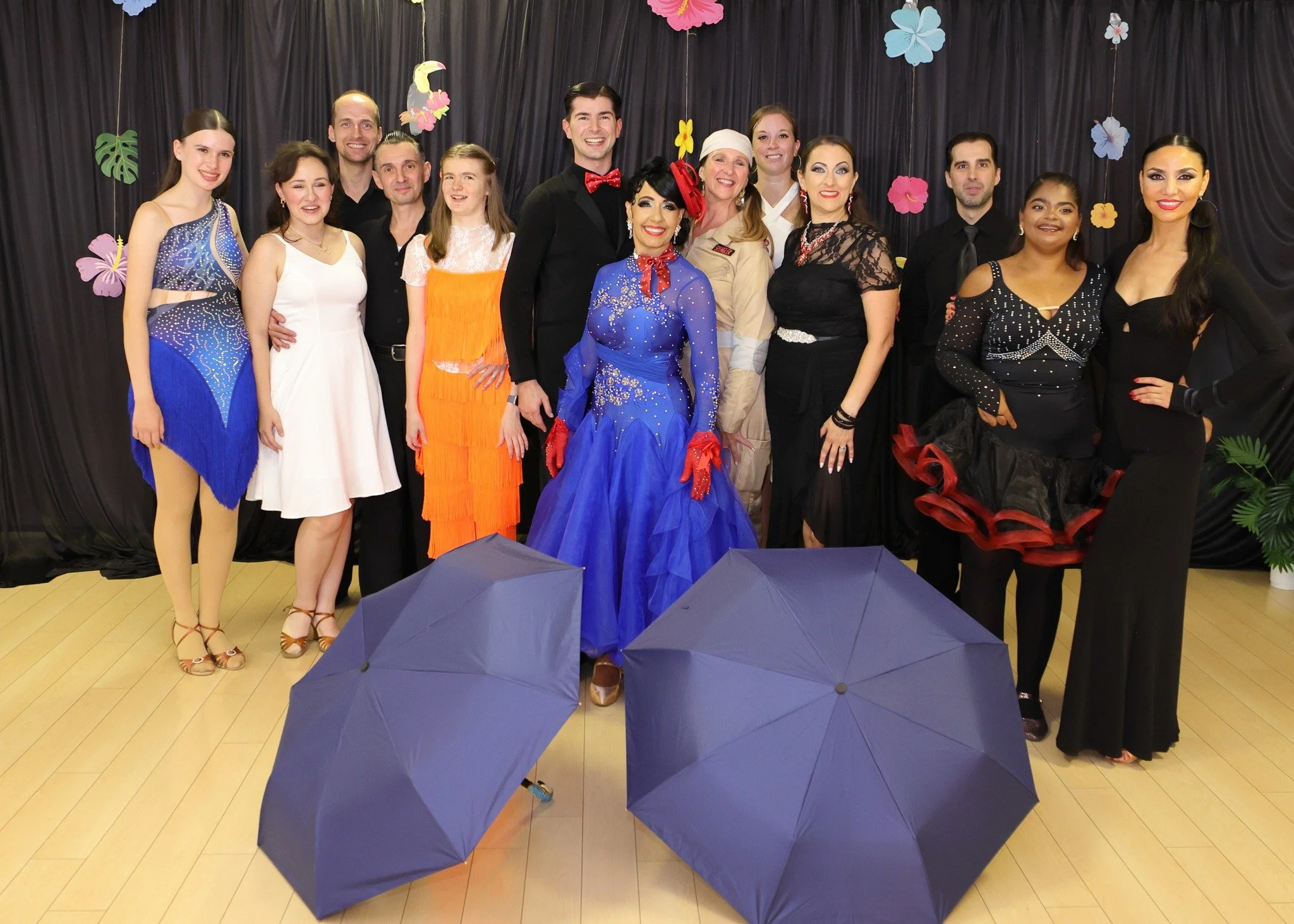 Dance Fire’s showcase dancers gather for a colorful group portrait