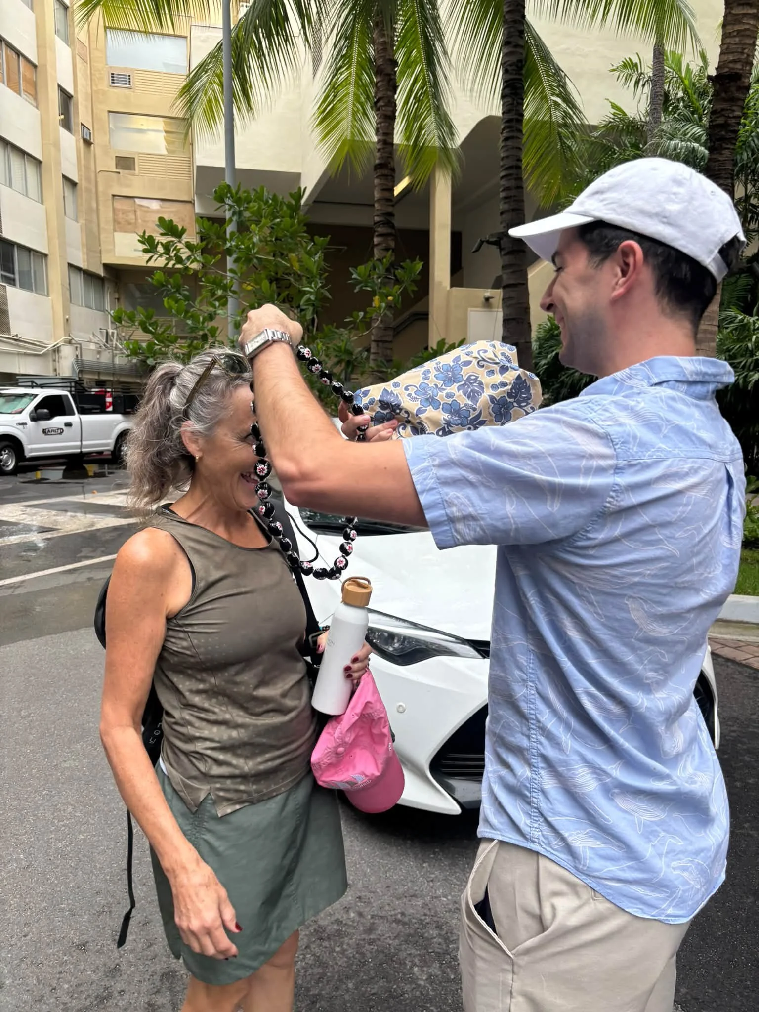 A traveler receives a flower lei during the Hawaii visit