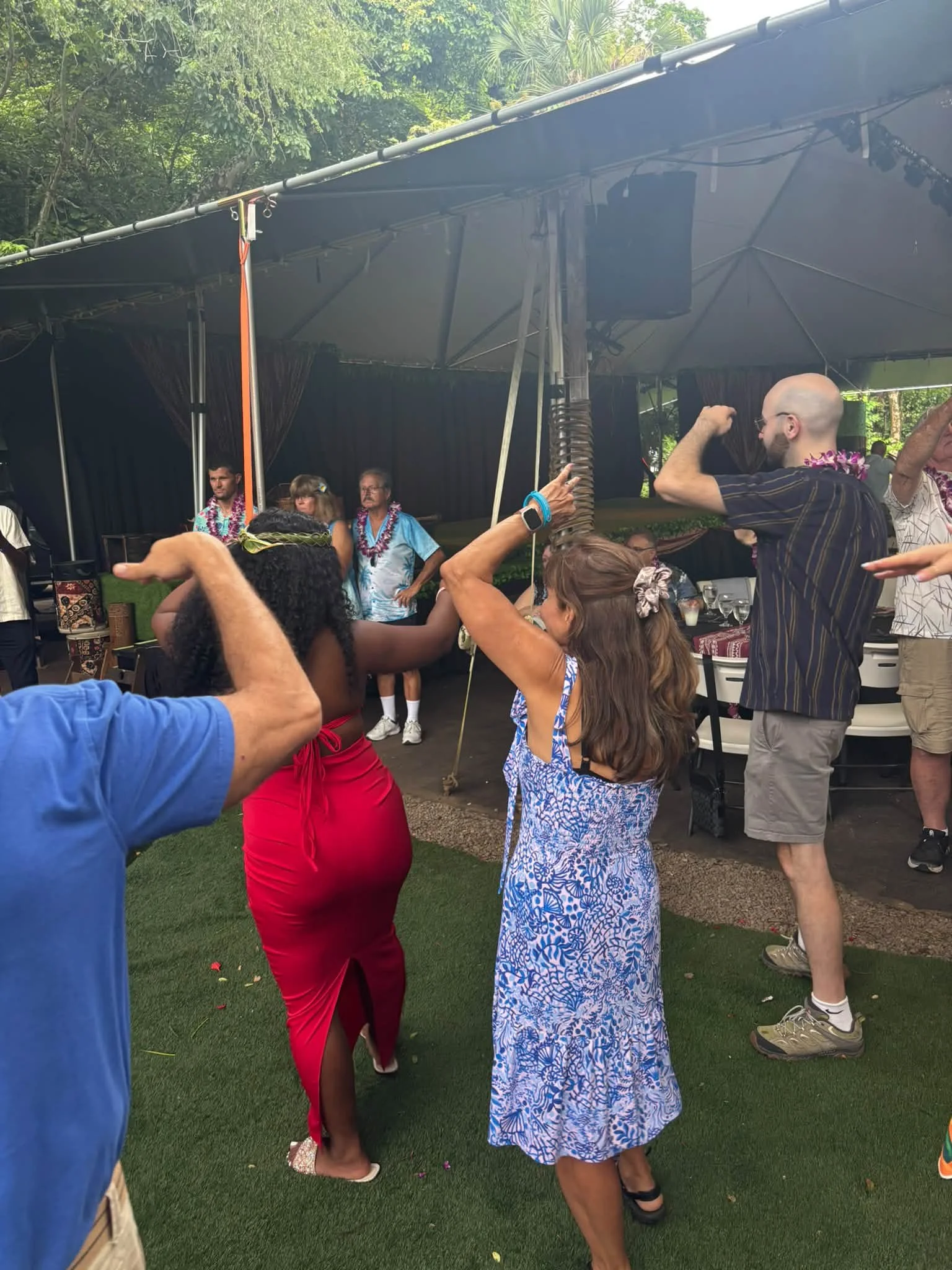 Travelers join an outdoor group activity during the Hawaii trip