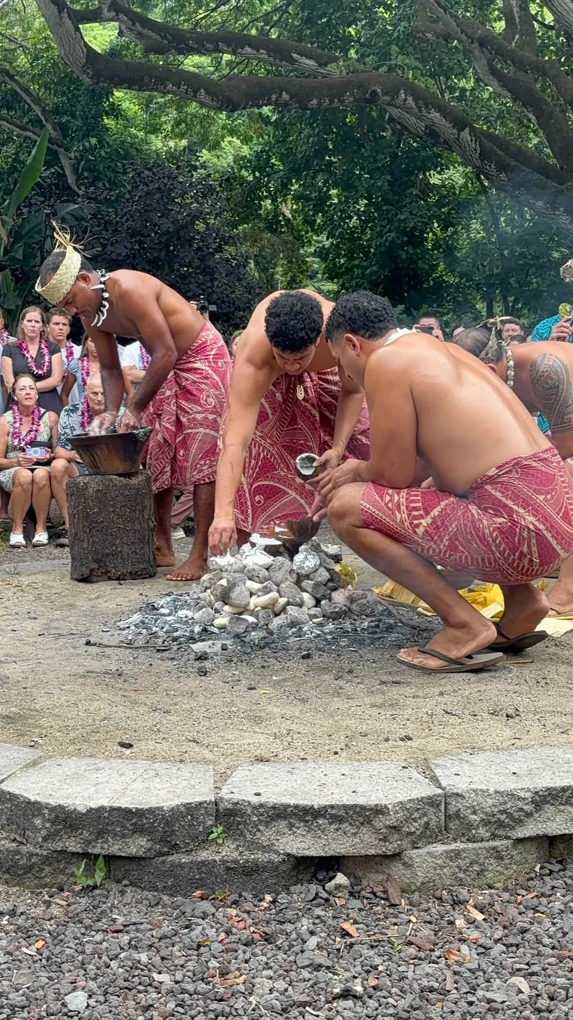 An outdoor cultural demonstration takes place during the Hawaii visit