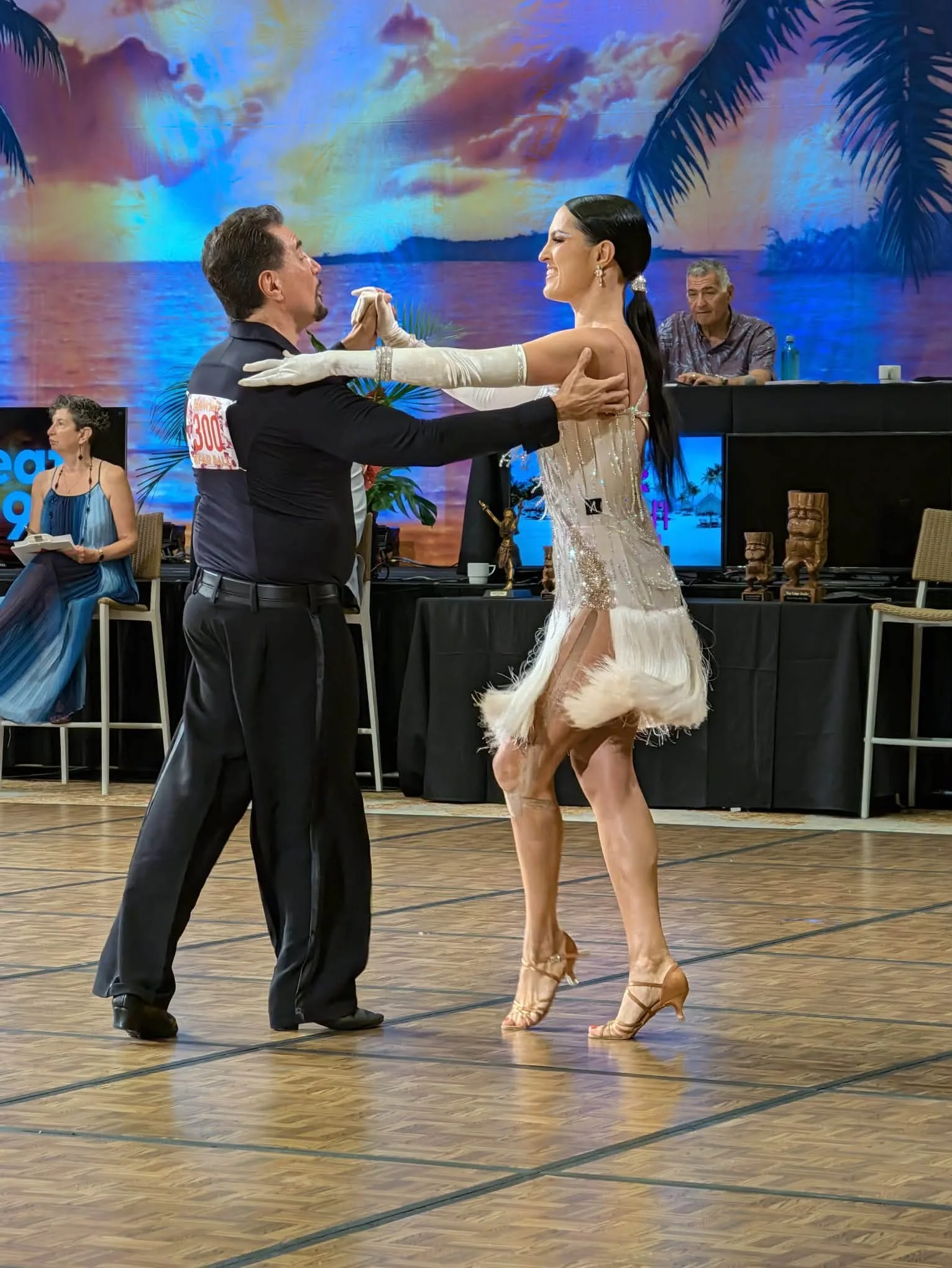 A couple dances in hold on the Hawaii Star Ball floor