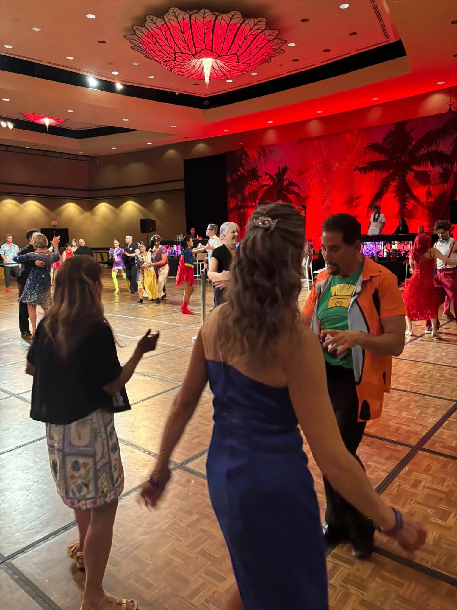 Guests enjoy social dancing on the Hawaii ballroom floor