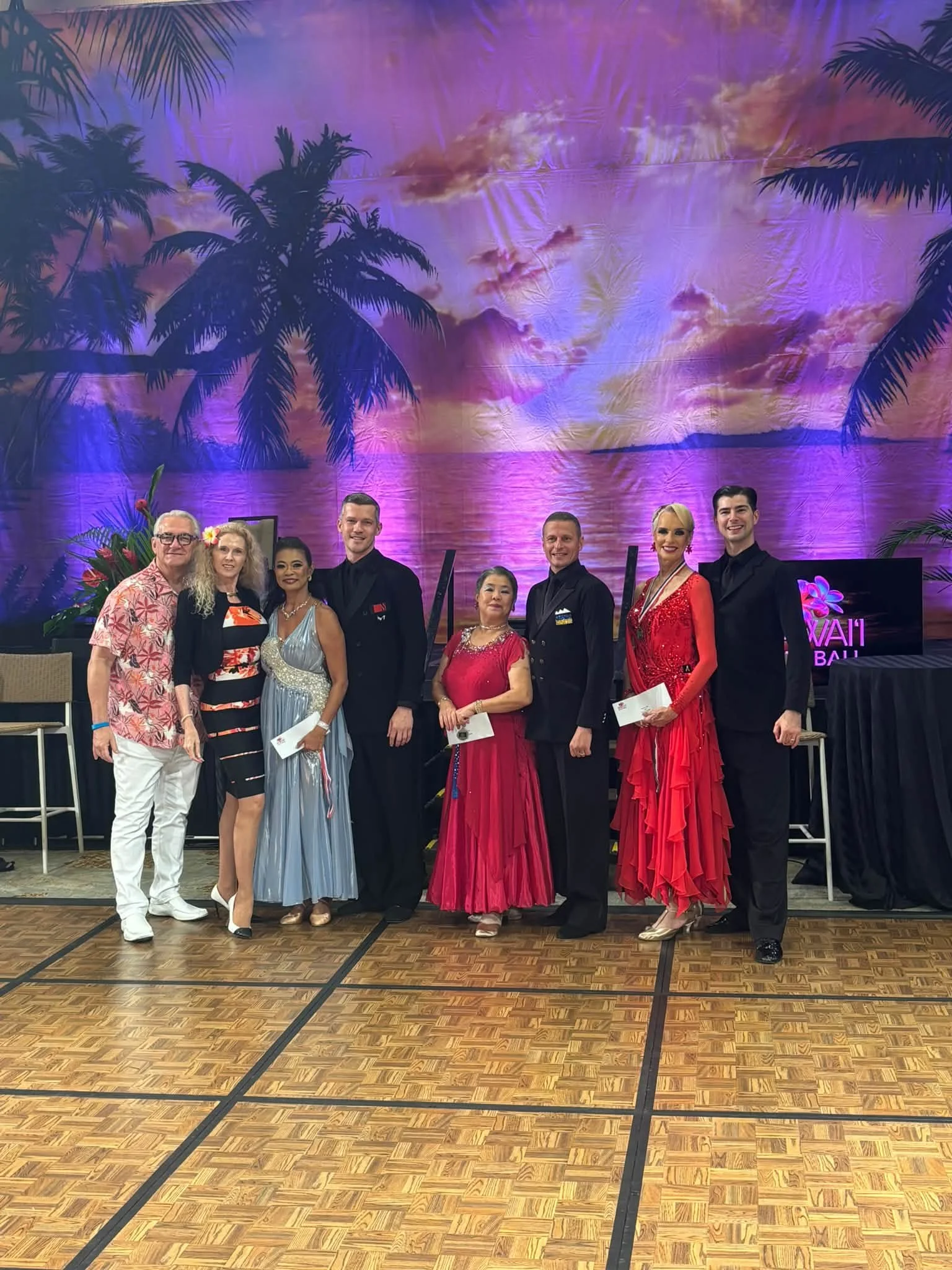 Dance Fire participants share a group portrait on the Hawaii Star Ball floor