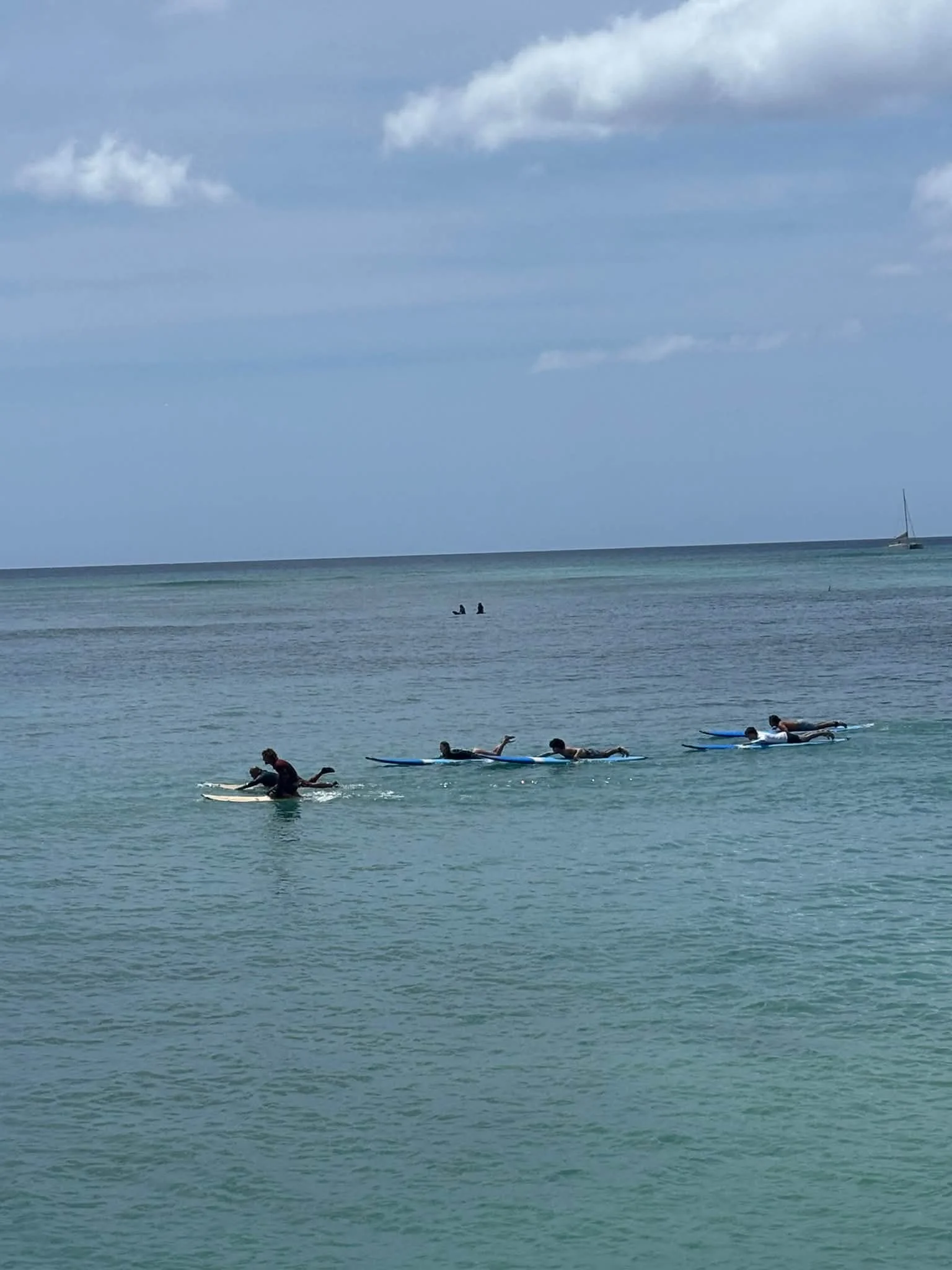 Swimmers enjoy the ocean during the Hawaii trip