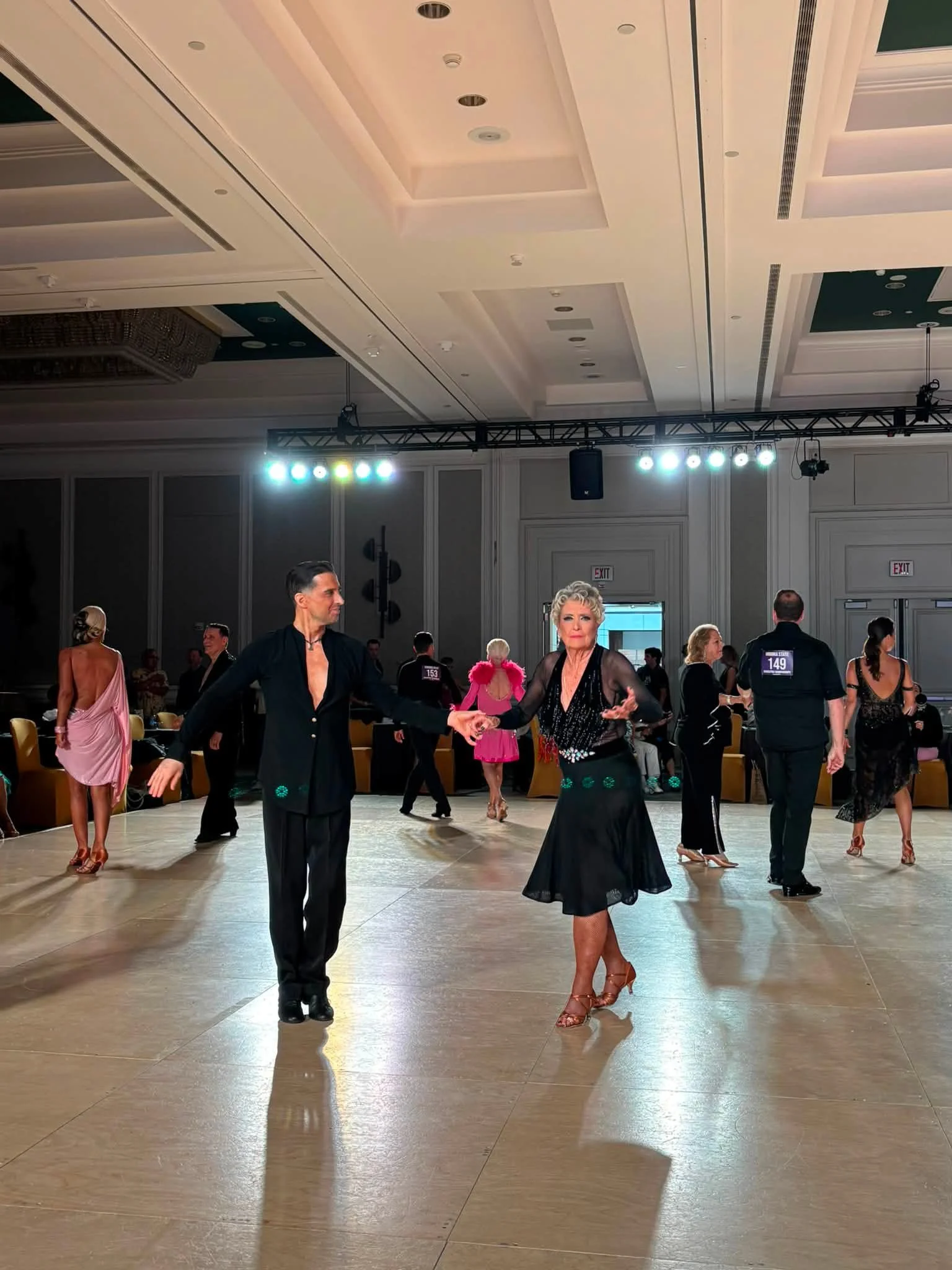 Couples dance together during the Virginia DanceSport competition