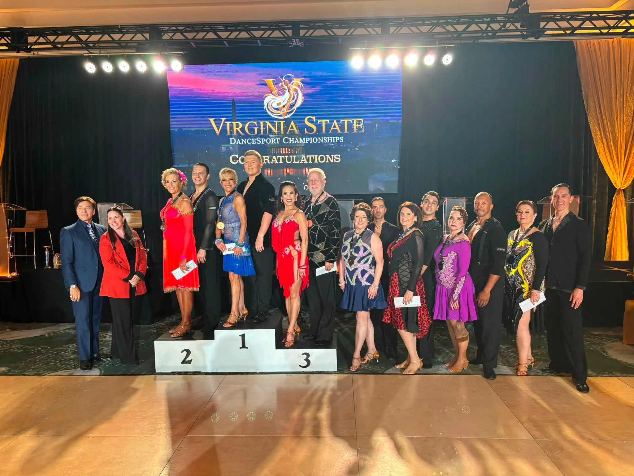 Virginia DanceSport competitors gather on the awards podium