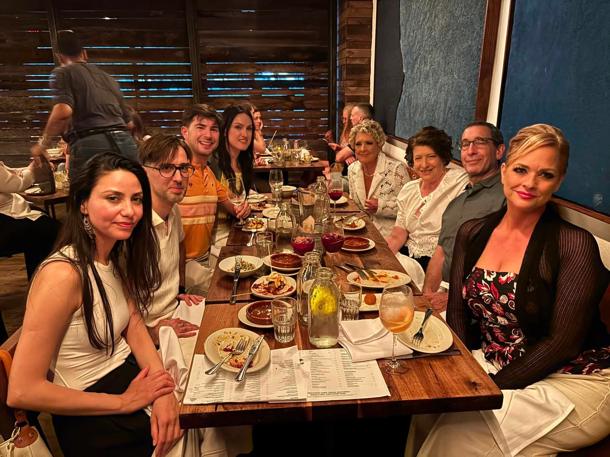 The Dance Fire team enjoys dinner together during the Virginia trip