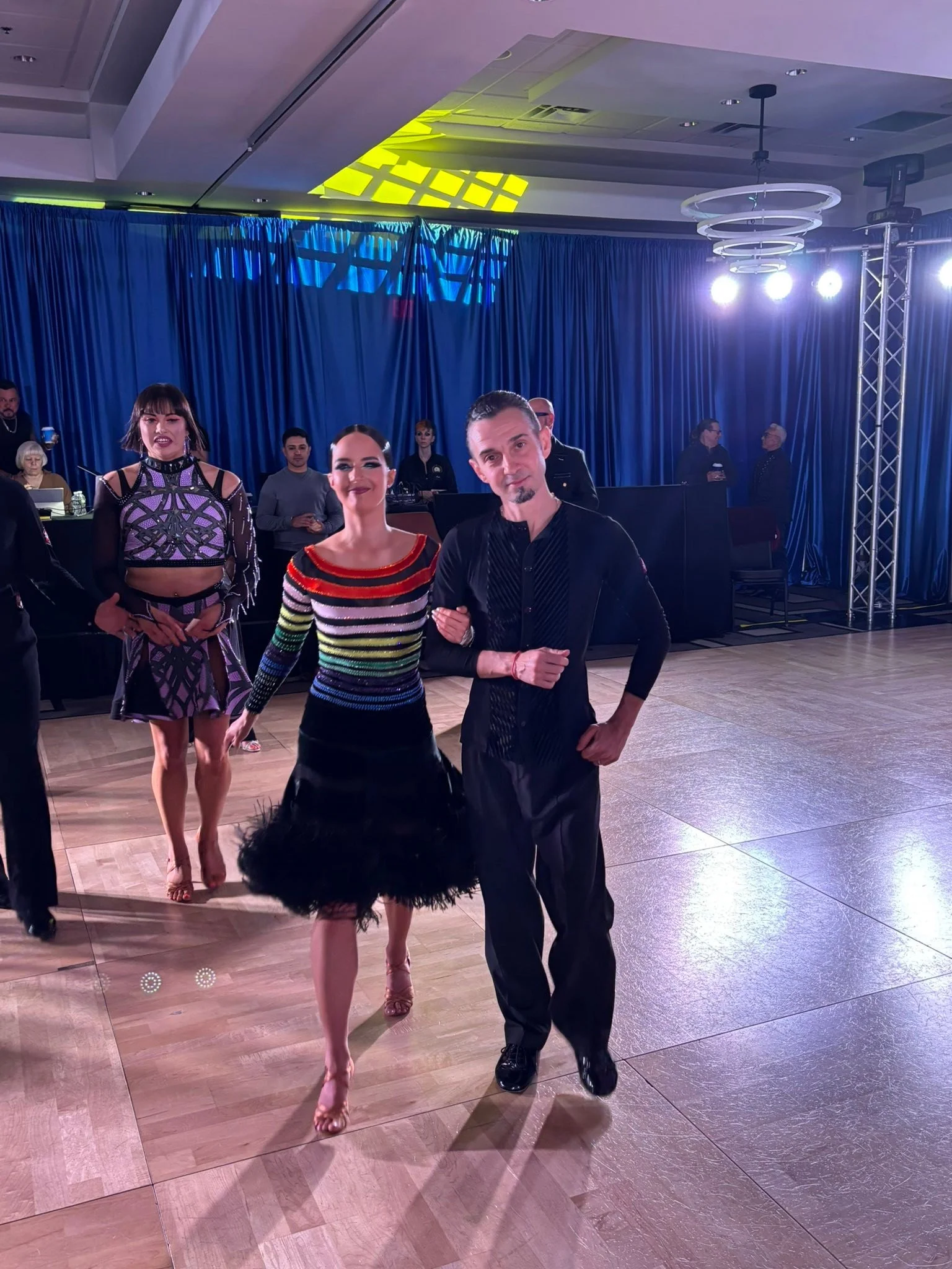 Youth dancers stand together on the Yankee Classic competition floor