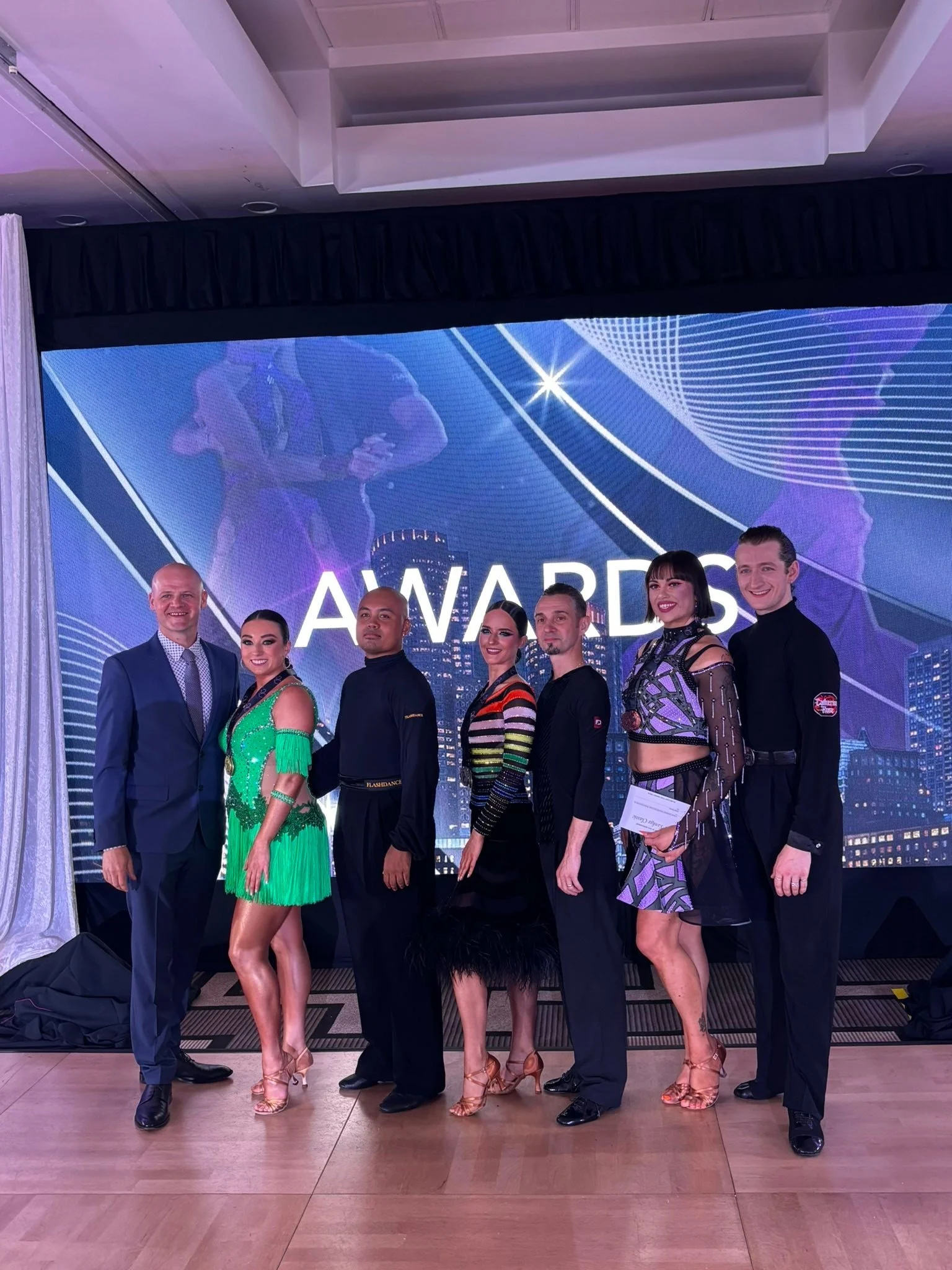 Latin competitors gather for an awards photo at Yankee Classic