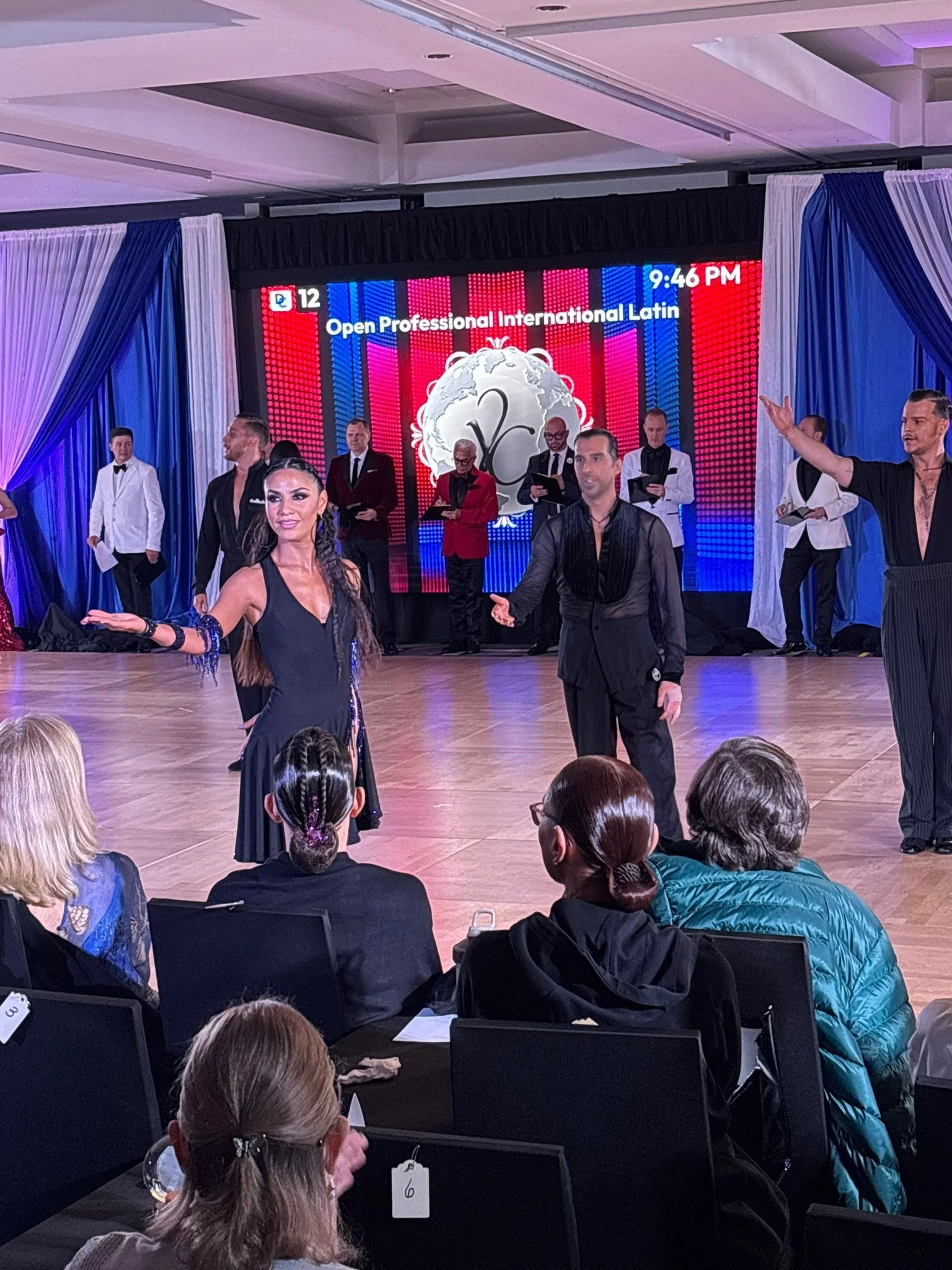 Young dancers perform a partnered routine before the Yankee Classic audience