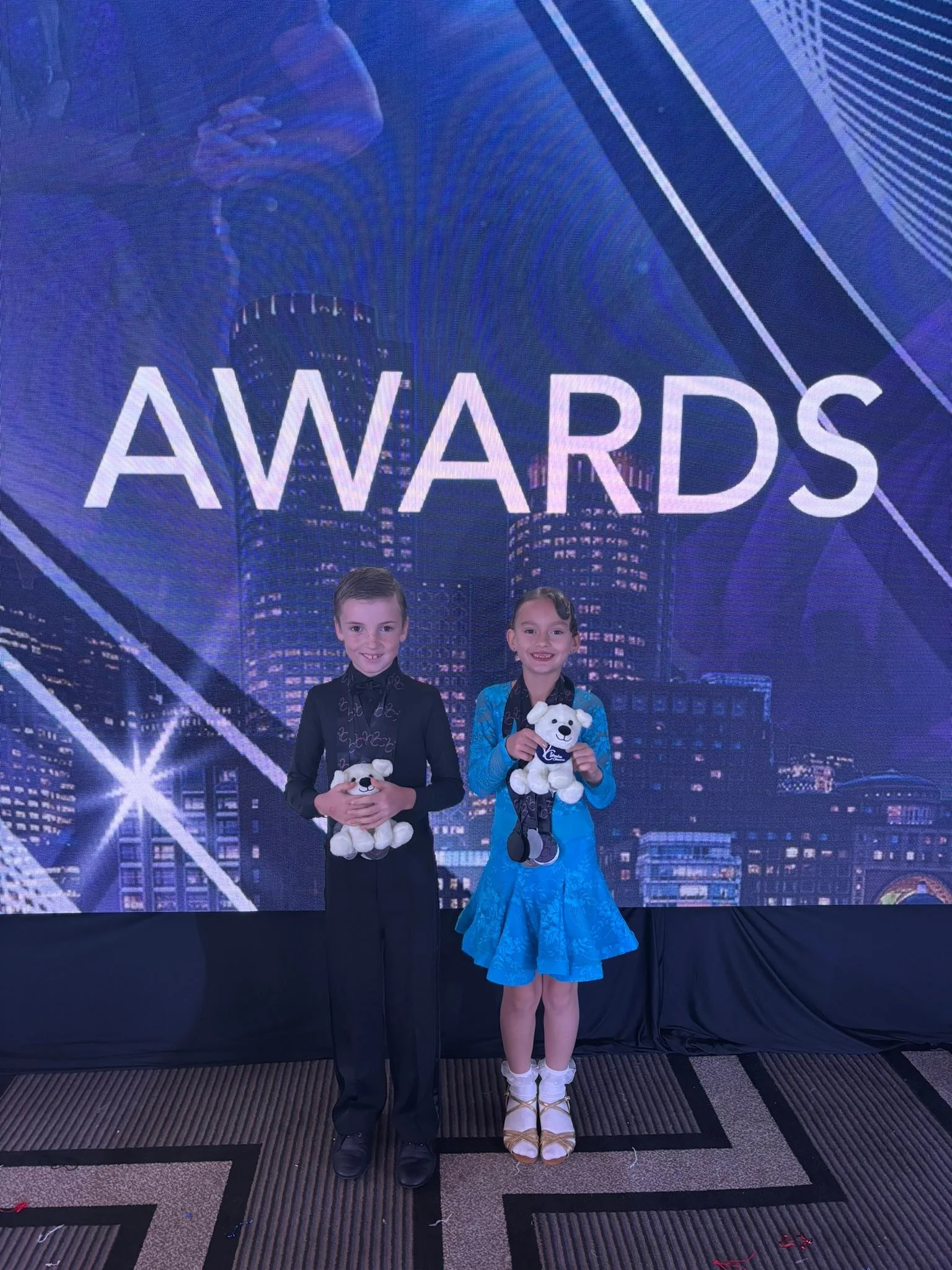 Young competitors display their awards at Yankee Classic