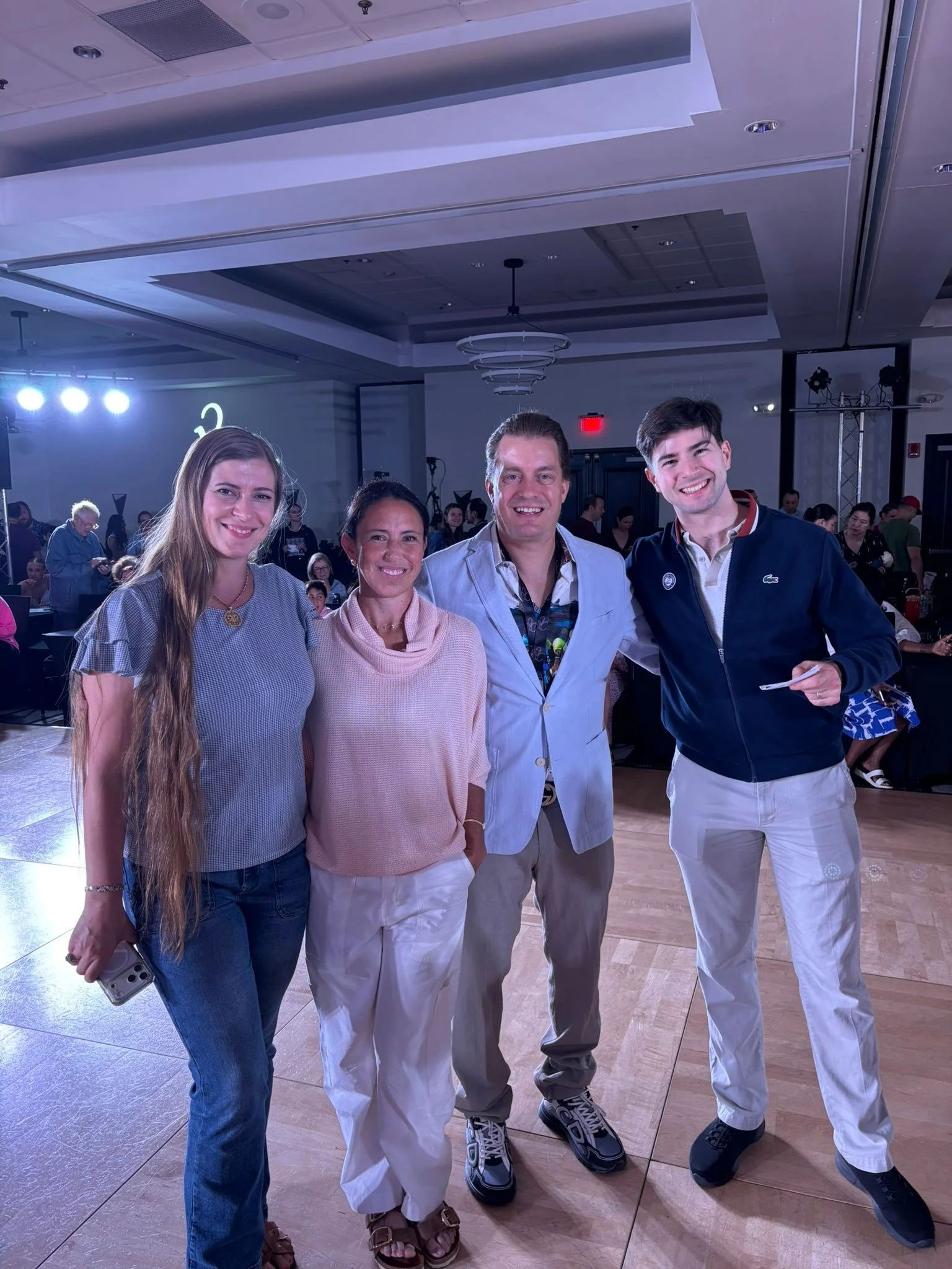 Dance Fire participants share a relaxed group photo during the Yankee Classic weekend